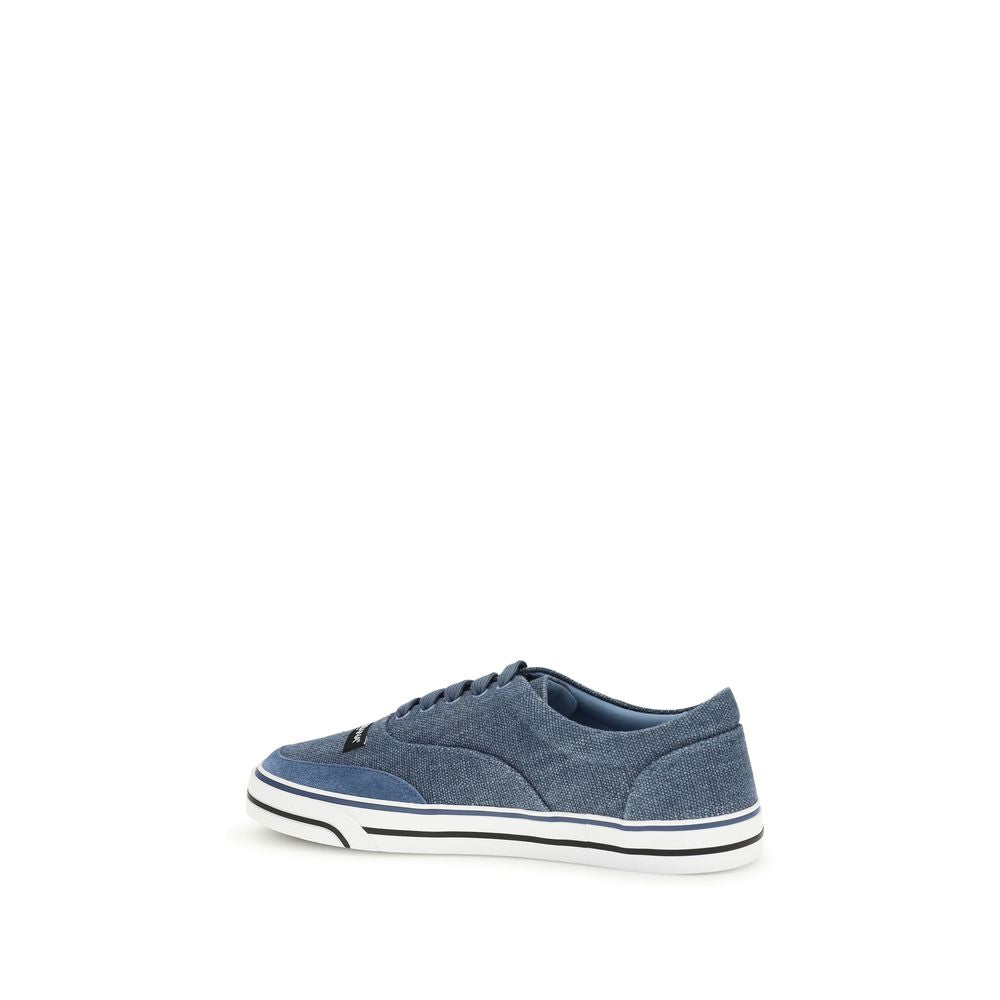 Indulge in the Dolce & Gabbana Blue Linen Low Top Sneakers, where exquisite craftsmanship meets contemporary elegance, perfect for the discerning individual seeking luxury.