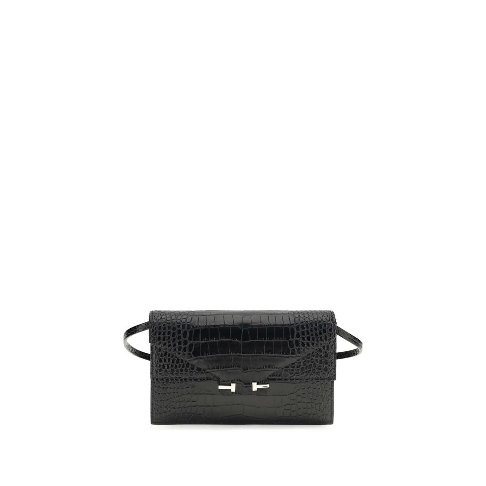 Experience the allure of the Tom Ford Black Calf Leather Bos Taurus Shoulder Bag, a masterpiece in luxury craftsmanship, designed to elevate your style with timeless sophistication.