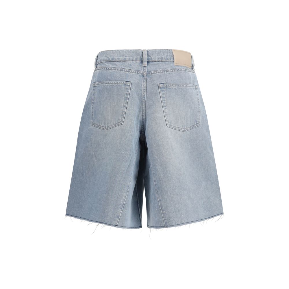 Discover the Our Legacy Blue Cotton Bermuda Shorts, crafted from premium Turkish fabric for effortless sophistication. Elevate your summer style with luxury and modern design.