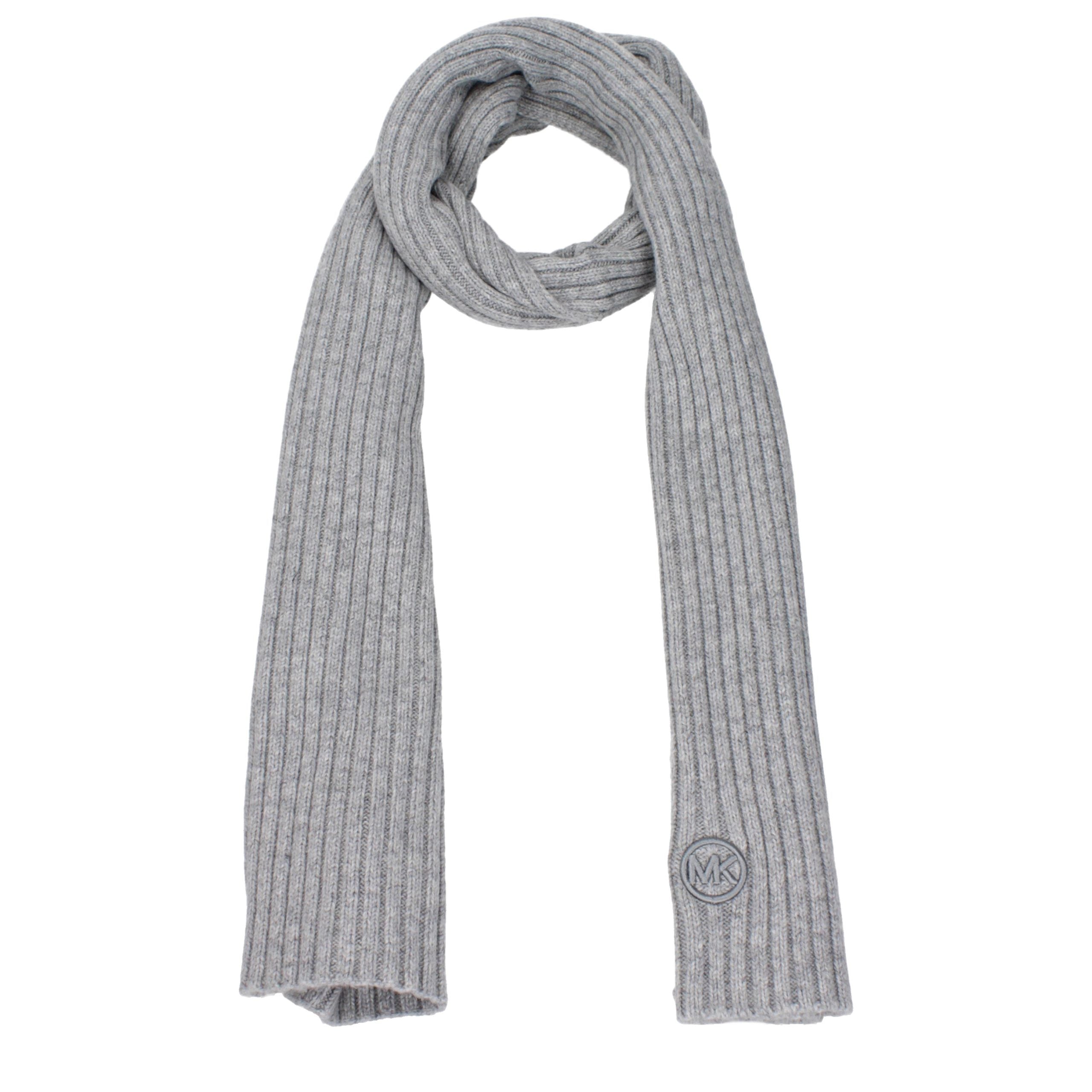 Elevate your style with the Michael Kors Gray Polyester Scarf, a luxurious blend of sophistication and versatility, perfect for any elegant occasion.