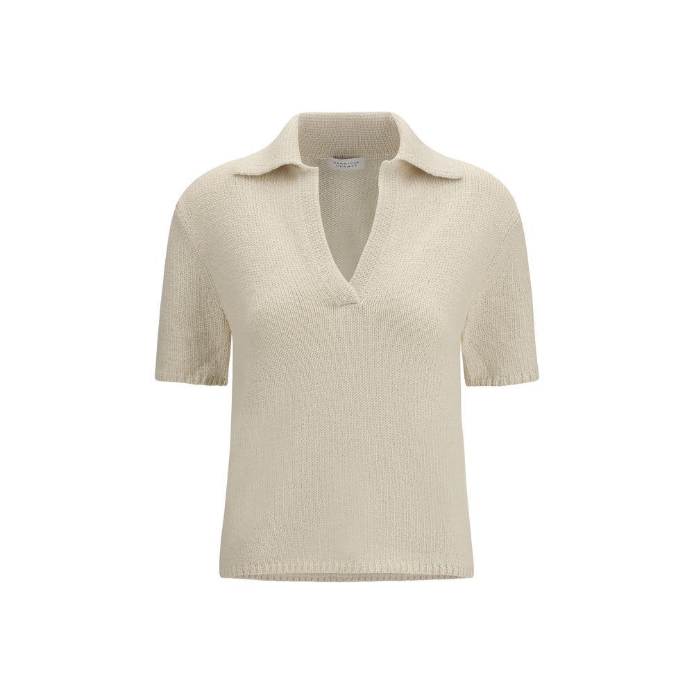 Indulge in the Gabriela Hearst Beige Cashmere Polo Shirt, a masterpiece of craftsmanship and luxury, perfect for the discerning wardrobe seeking timeless elegance.