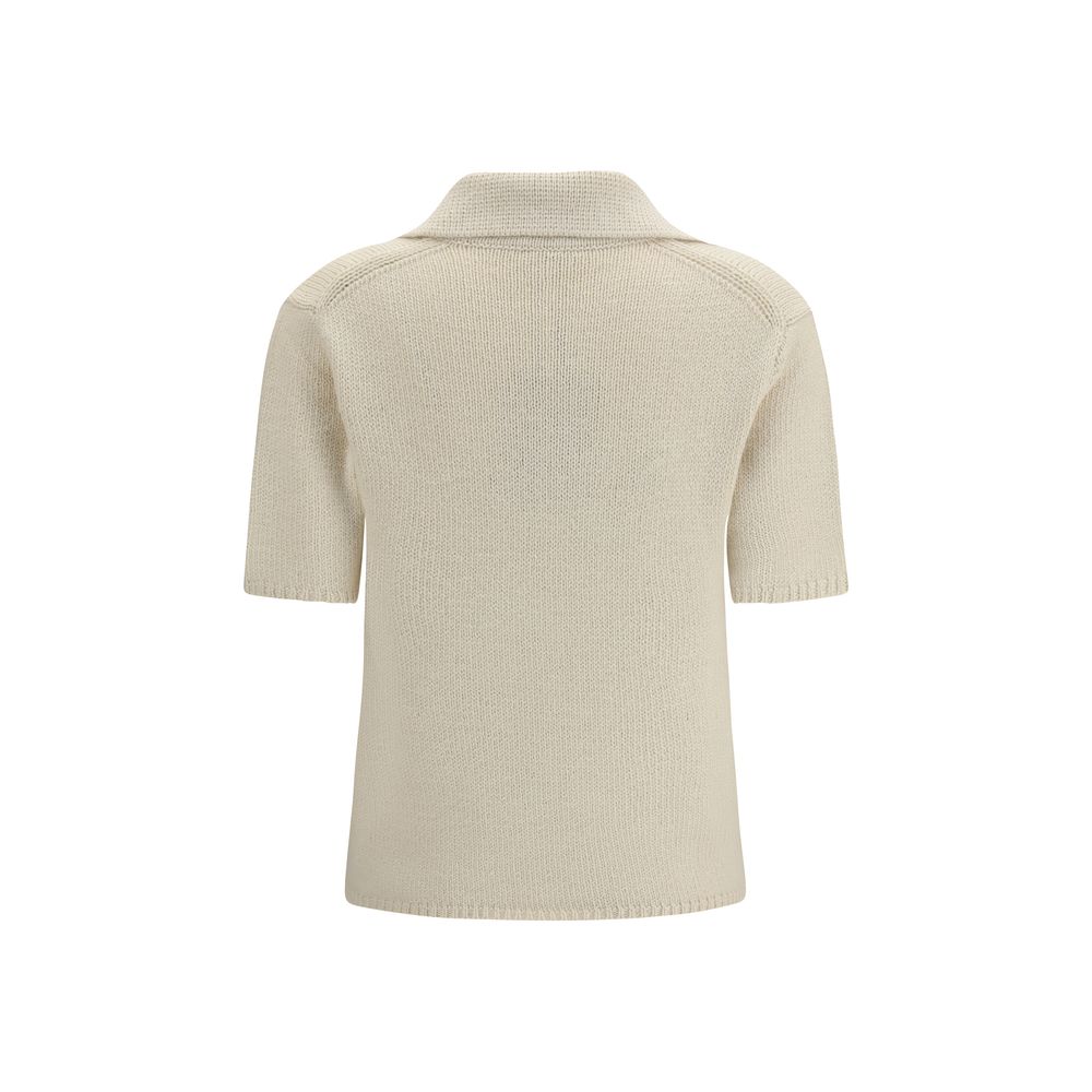 Indulge in the Gabriela Hearst Beige Cashmere Polo Shirt, where exquisite craftsmanship meets timeless elegance, perfect for the discerning connoisseur of luxury.