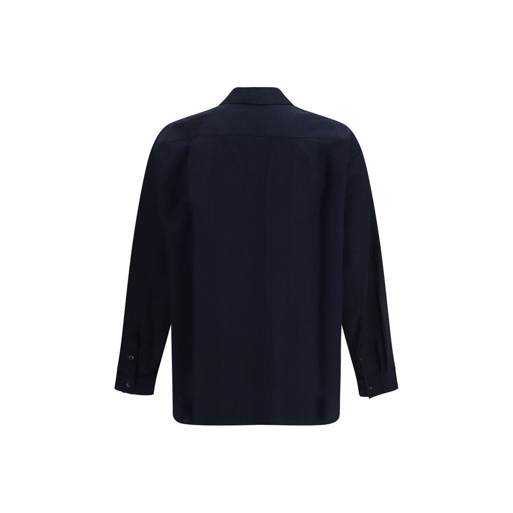 Elevate your wardrobe with the Giorgio Armani Blue Cotton Shirt, a timeless blend of luxury and sophistication crafted from 100% cotton for effortless elegance.
