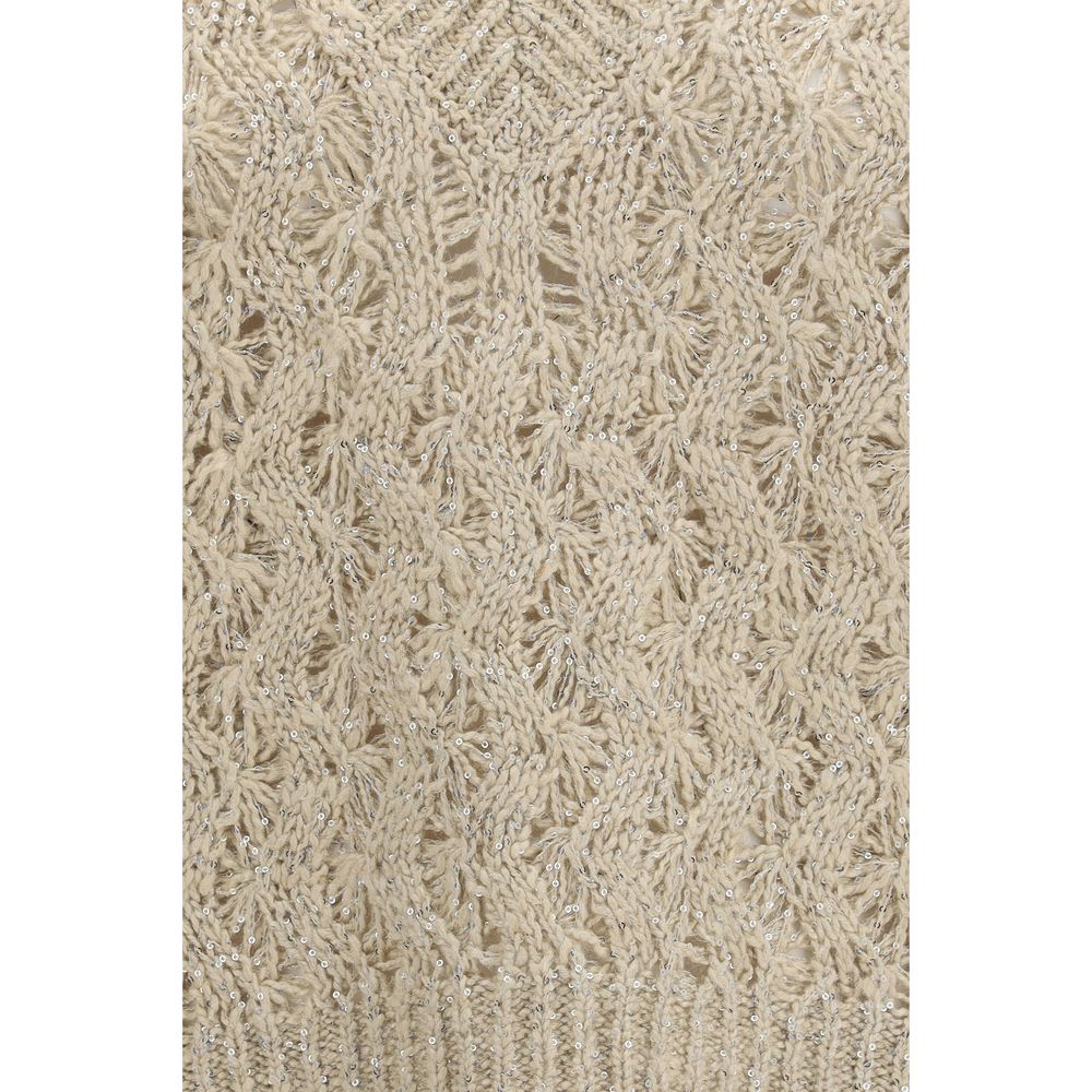 Elevate your wardrobe with the Brunello Cucinelli Beige Silk Sleeveless Sweater, a luxurious blend of silk and linen, adorned with exquisite sequins for timeless elegance.