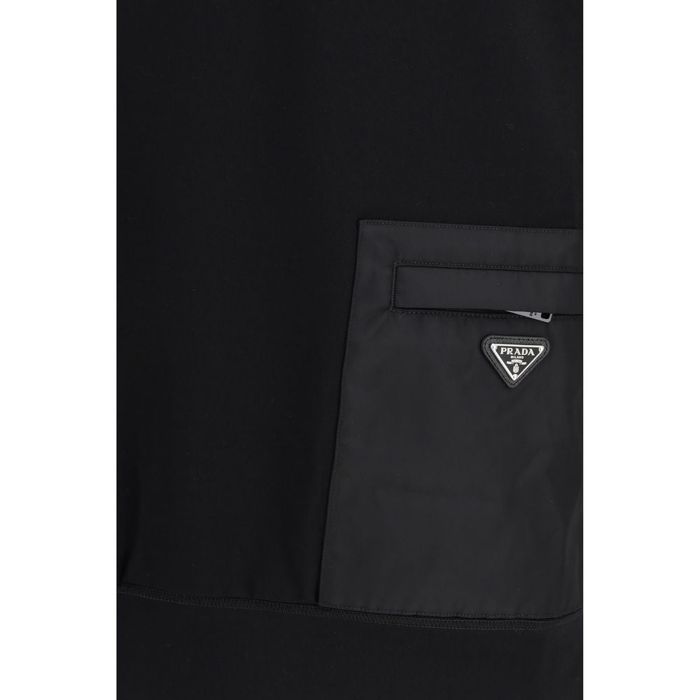 Indulge in the Prada Black Viscose Sweatshirt, a luxurious blend of comfort and elegance from the SS26 collection, crafted for those who embrace refined style.