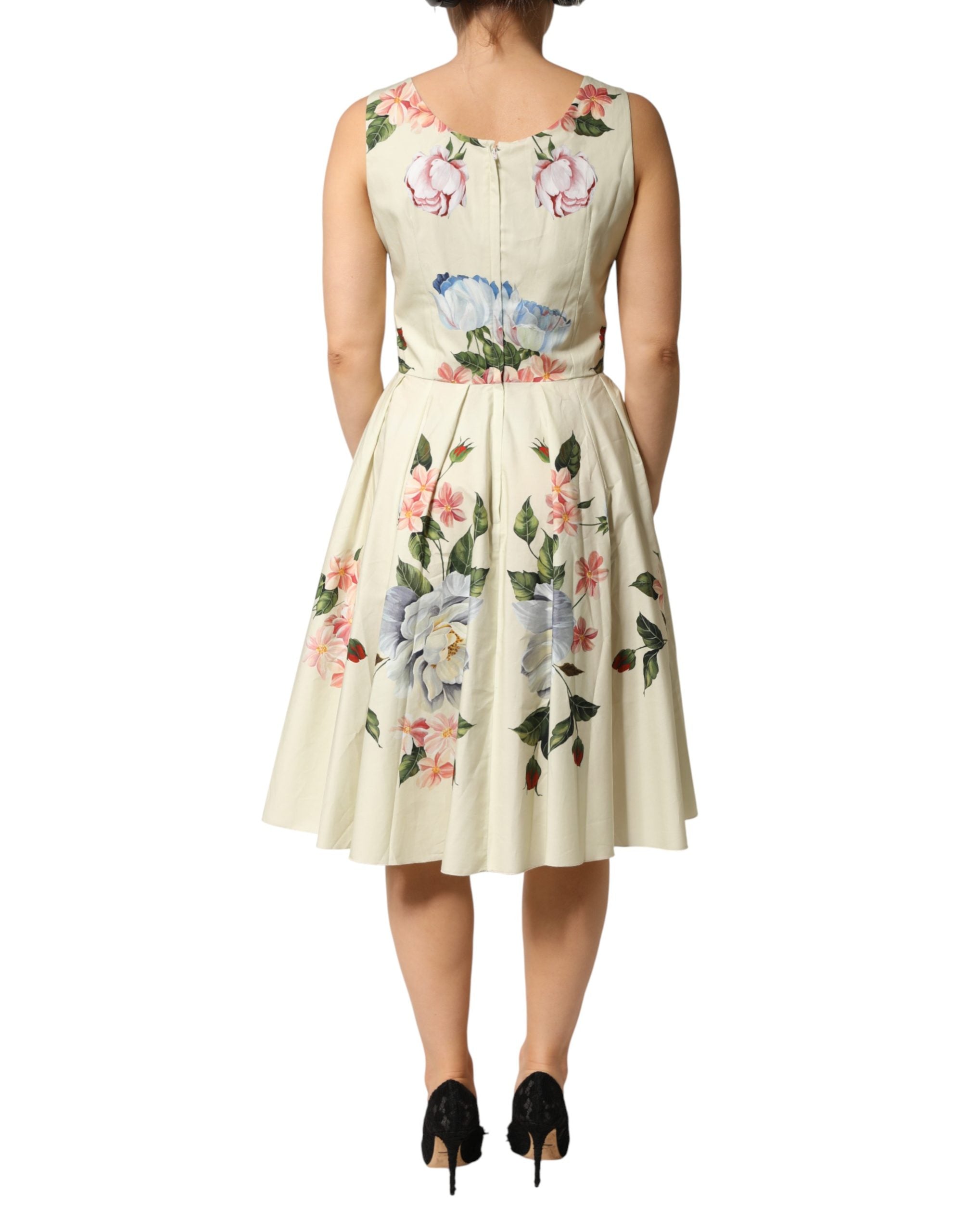 Indulge in the exquisite Dolce & Gabbana Beige Floral Sleeveless A-line Midi Dress, a masterpiece of Italian craftsmanship that embodies timeless elegance and luxurious allure.