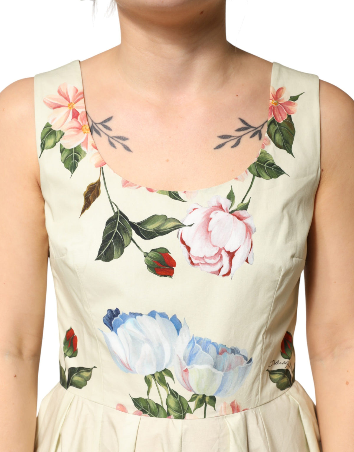 Indulge in the exquisite Dolce & Gabbana Beige Floral Sleeveless A-line Midi Dress, a masterpiece of Italian craftsmanship in luxurious cotton, perfect for enchanting occasions.