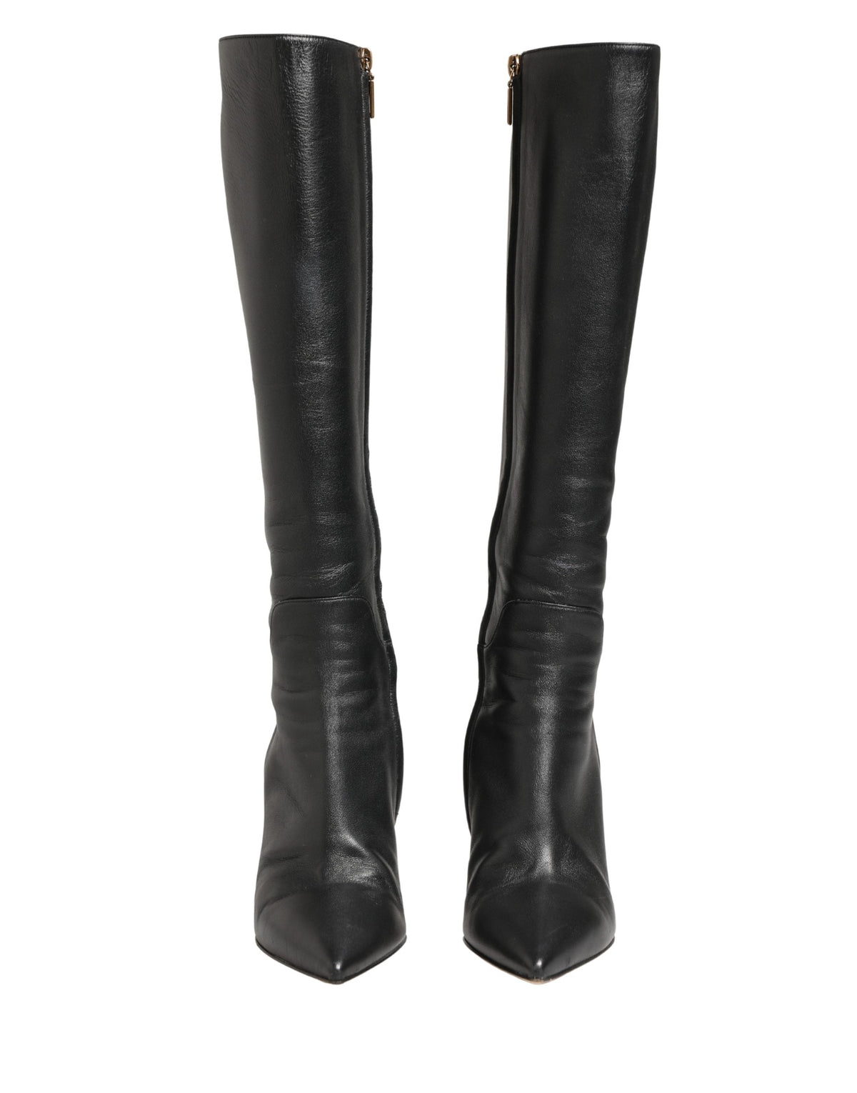 Experience the exquisite allure of Dolce & Gabbana's black leather knee-high boots, a testament to Italian craftsmanship that elevates every ensemble with timeless elegance.