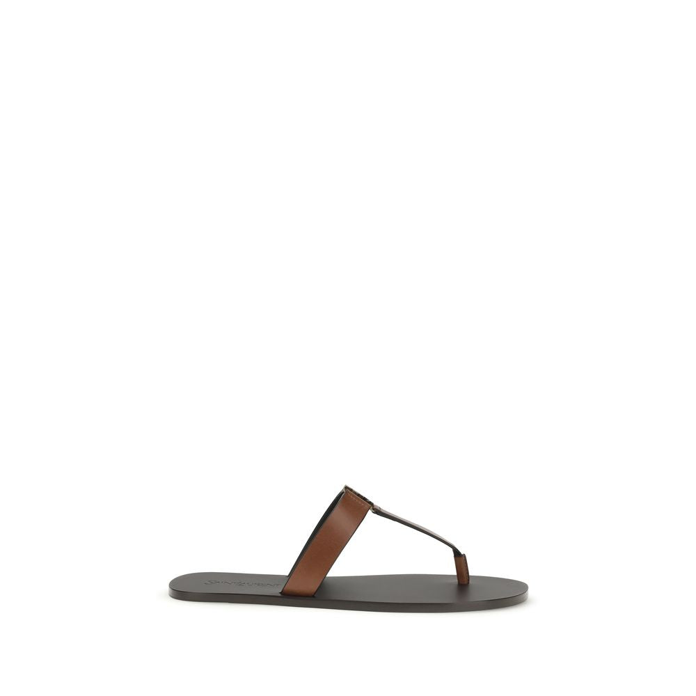 Indulge in the exquisite Saint Laurent Brown Calf Leather Bos Taurus Flip-Flop Sandals, where unparalleled craftsmanship meets effortless elegance for the discerning connoisseur.