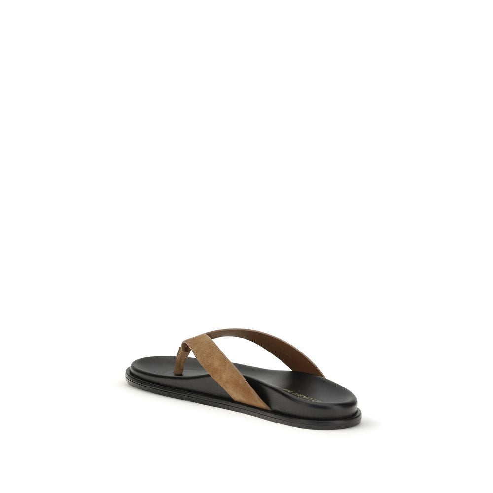 Indulge in the exquisite craftsmanship of Stuart Weitzman's Multicolor Calf Leather Bos Taurus Flip-Flop Sandals, where timeless elegance meets effortless summer sophistication.