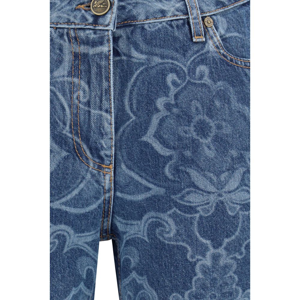 Indulge in the Etro Blue Cotton Flared Jeans, a masterpiece of ornamental jacquard denim that embodies timeless elegance and sophisticated allure for every discerning wardrobe.