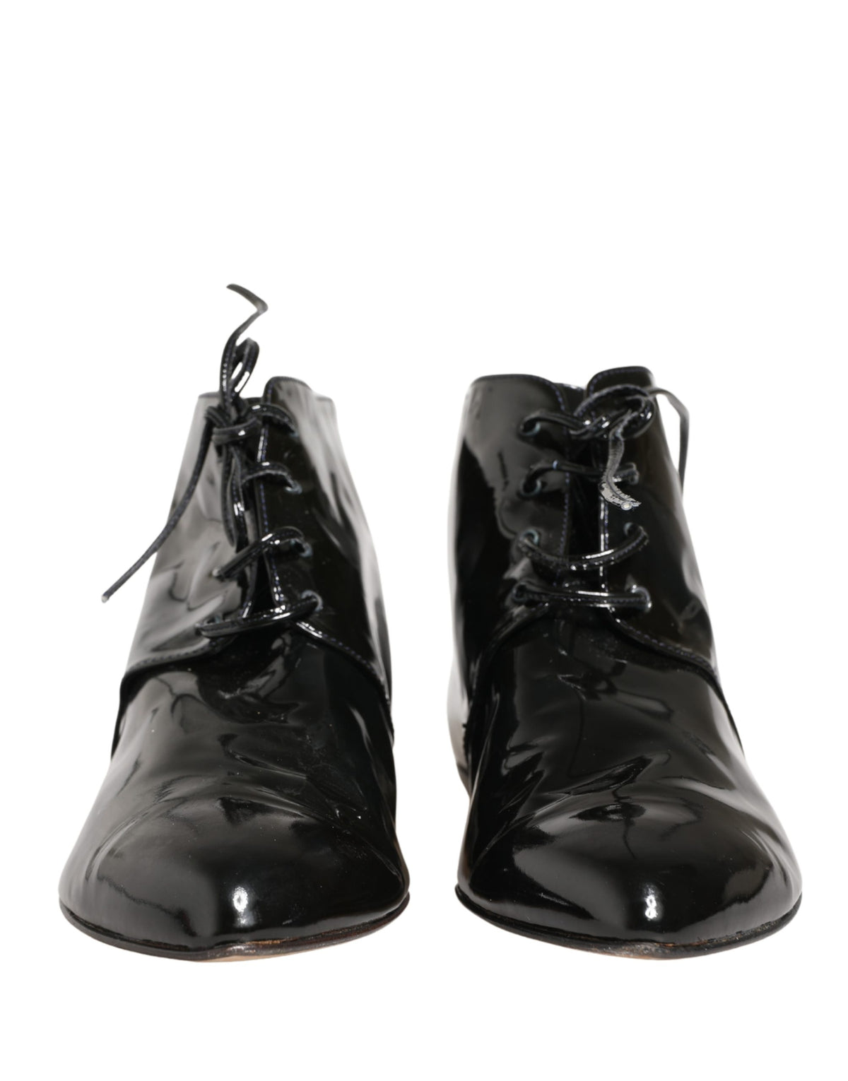 Discover the exquisite Dolce & Gabbana Black Leather Ankle Boots, a masterpiece of Italian craftsmanship that elevates your style with timeless elegance and allure.