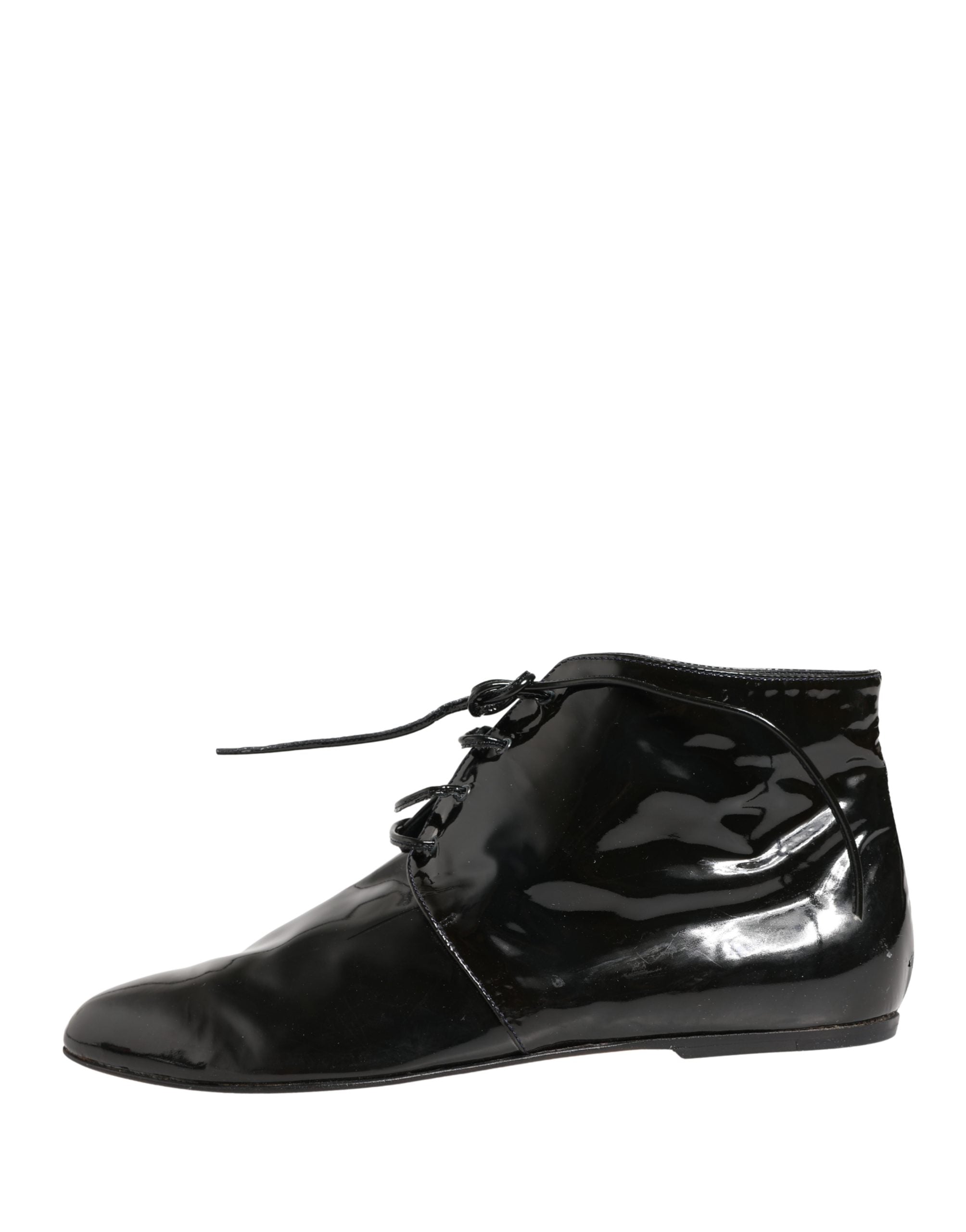 Indulge in the exquisite Dolce & Gabbana Black Leather Ankle Boots, where Italian craftsmanship meets timeless elegance, perfect for the discerning fashion connoisseur.