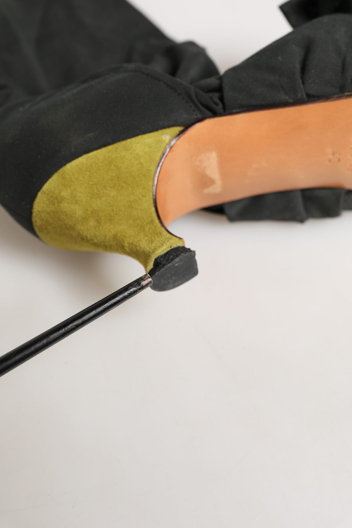 Step into a world of opulence with Dolce & Gabbana's Black Yellow Suede Mid Calf Boots, where exquisite craftsmanship meets vibrant elegance, perfect for the discerning connoisseur.