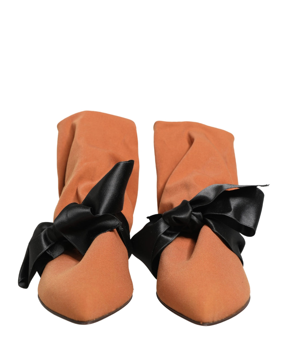 Experience the exquisite allure of Dolce & Gabbana's brown black suede ankle boots, a masterpiece of Italian craftsmanship that elevates your style with timeless elegance.