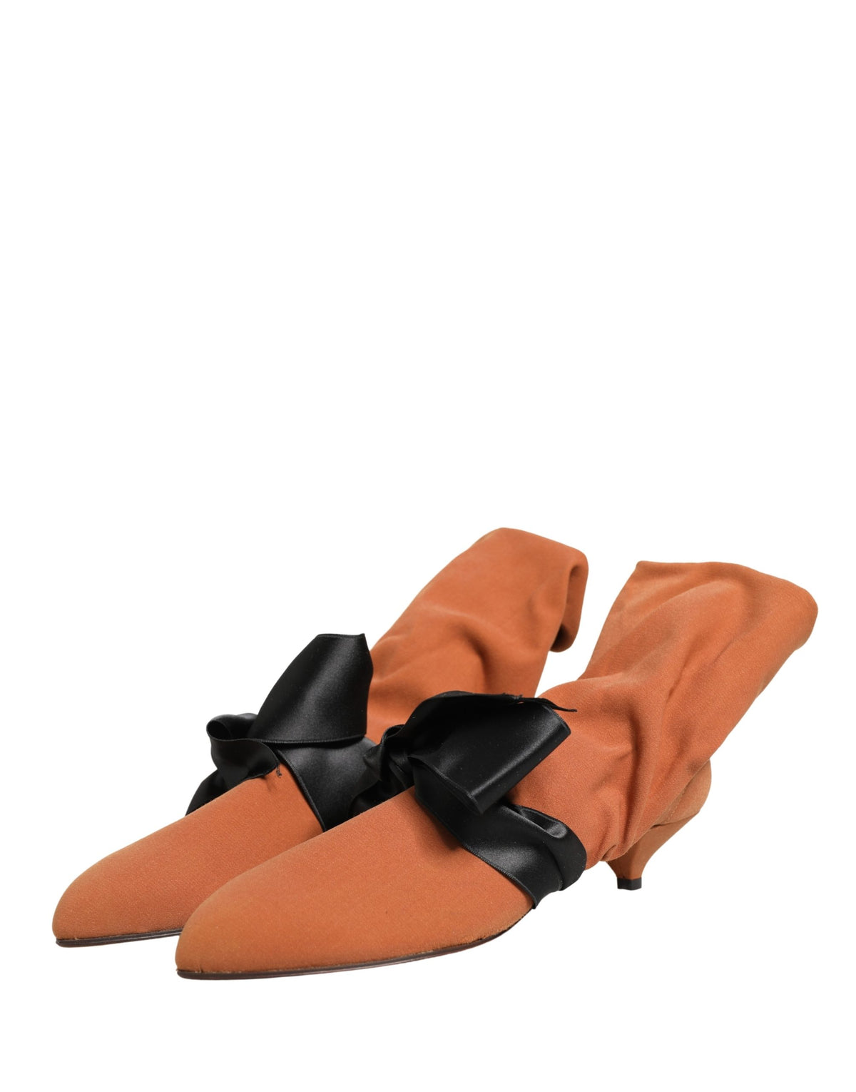 Experience the exquisite allure of Dolce & Gabbana's brown black suede ankle boots, a masterful blend of Italian craftsmanship and timeless elegance for the discerning individual.