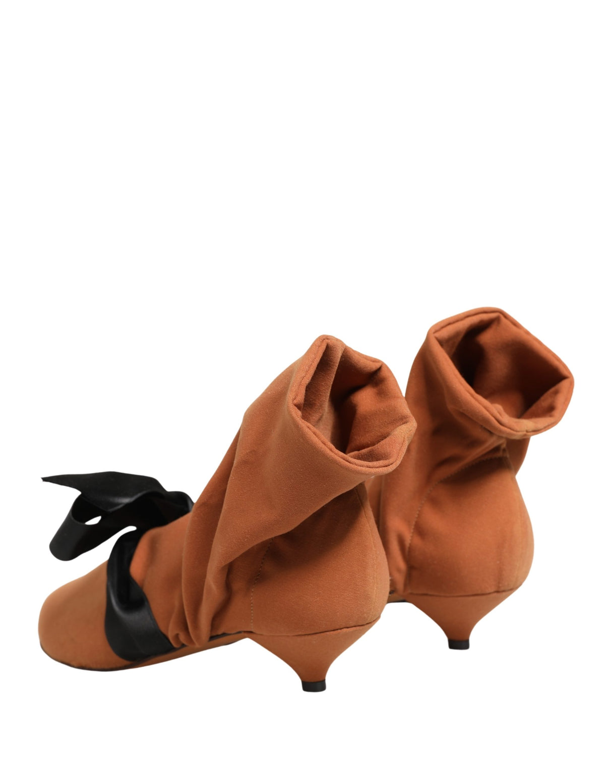 Step into a realm of artisanal luxury with Dolce & Gabbana's brown black suede ankle boots, where exquisite craftsmanship meets timeless elegance for the discerning individual.