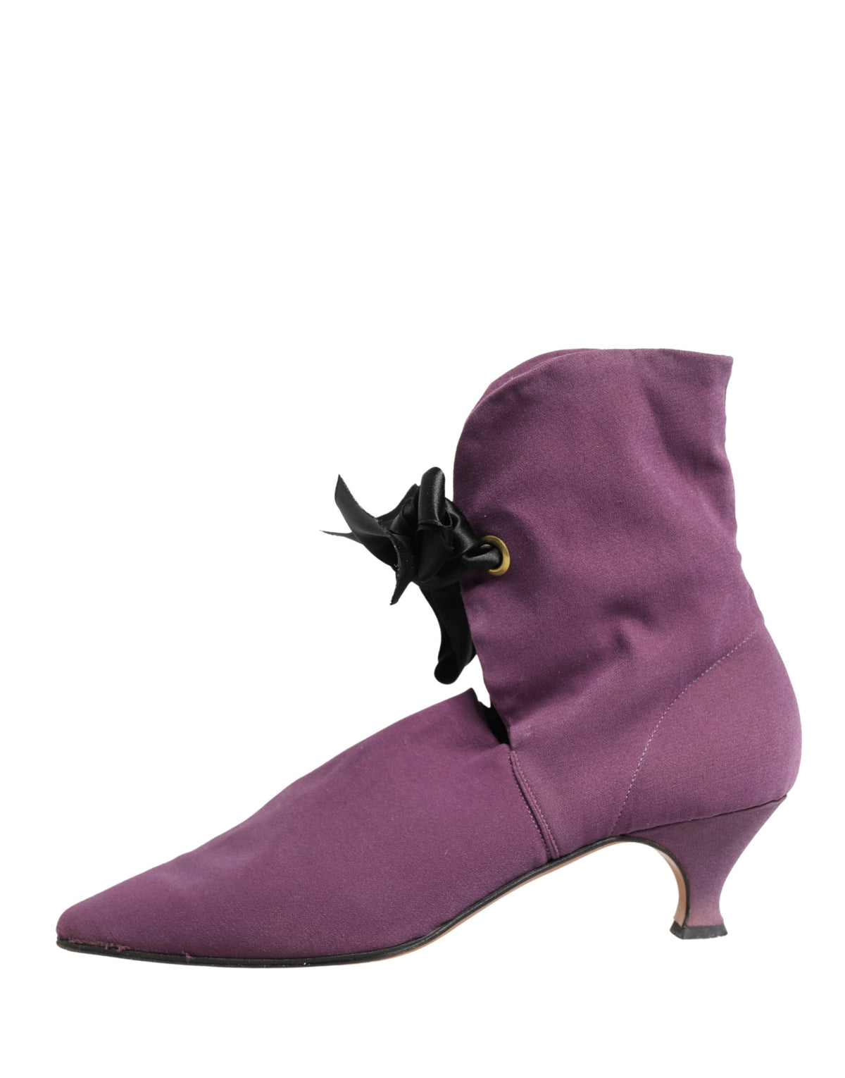 Elevate your style with Dolce & Gabbana's Purple Mid Calf Boots, a sublime fusion of sumptuous suede and Italian craftsmanship, perfect for the discerning individual.