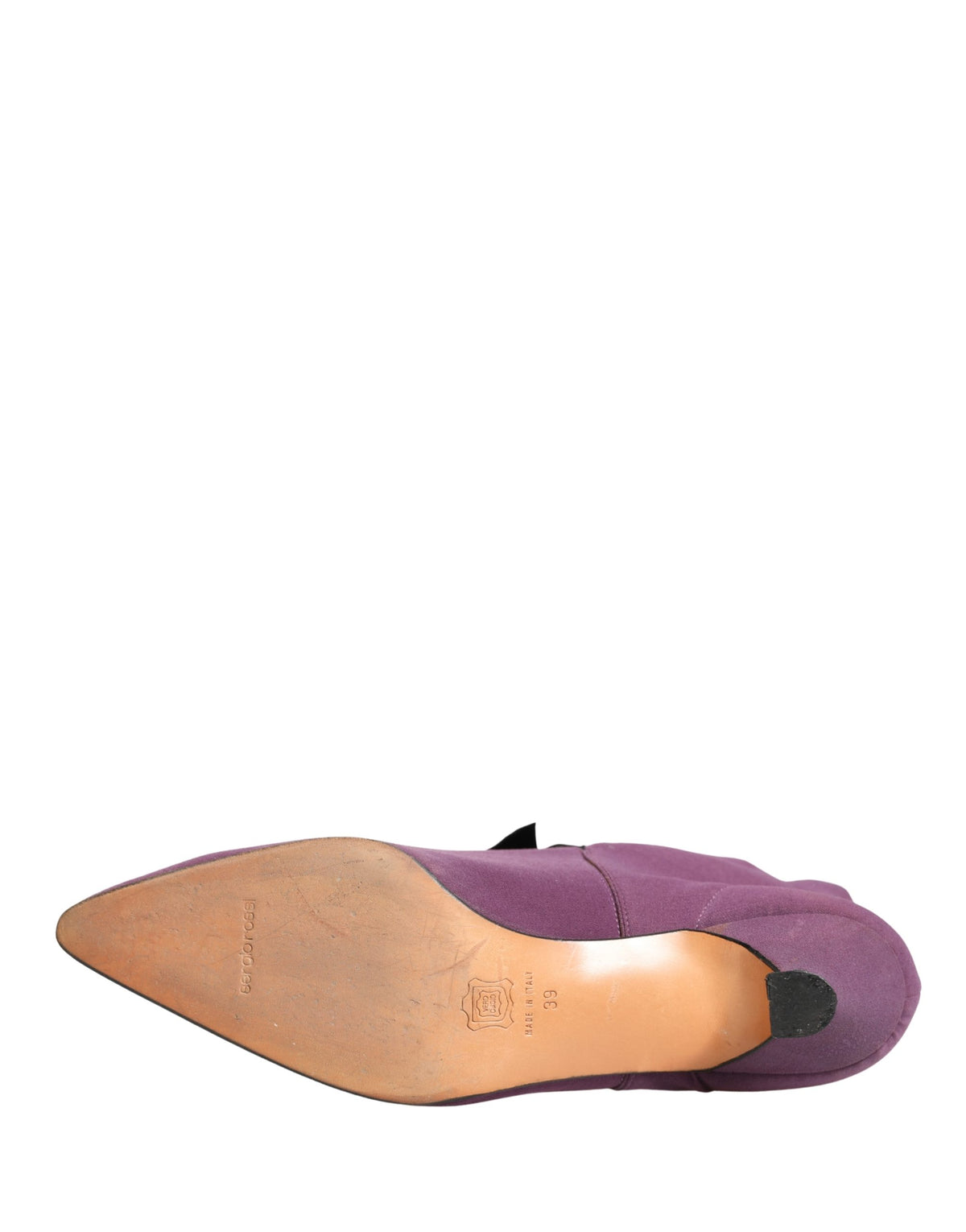 Indulge in the exquisite allure of Dolce & Gabbana's Purple Mid Calf Boots, crafted from sumptuous suede, embodying timeless Italian luxury and unparalleled sophistication.