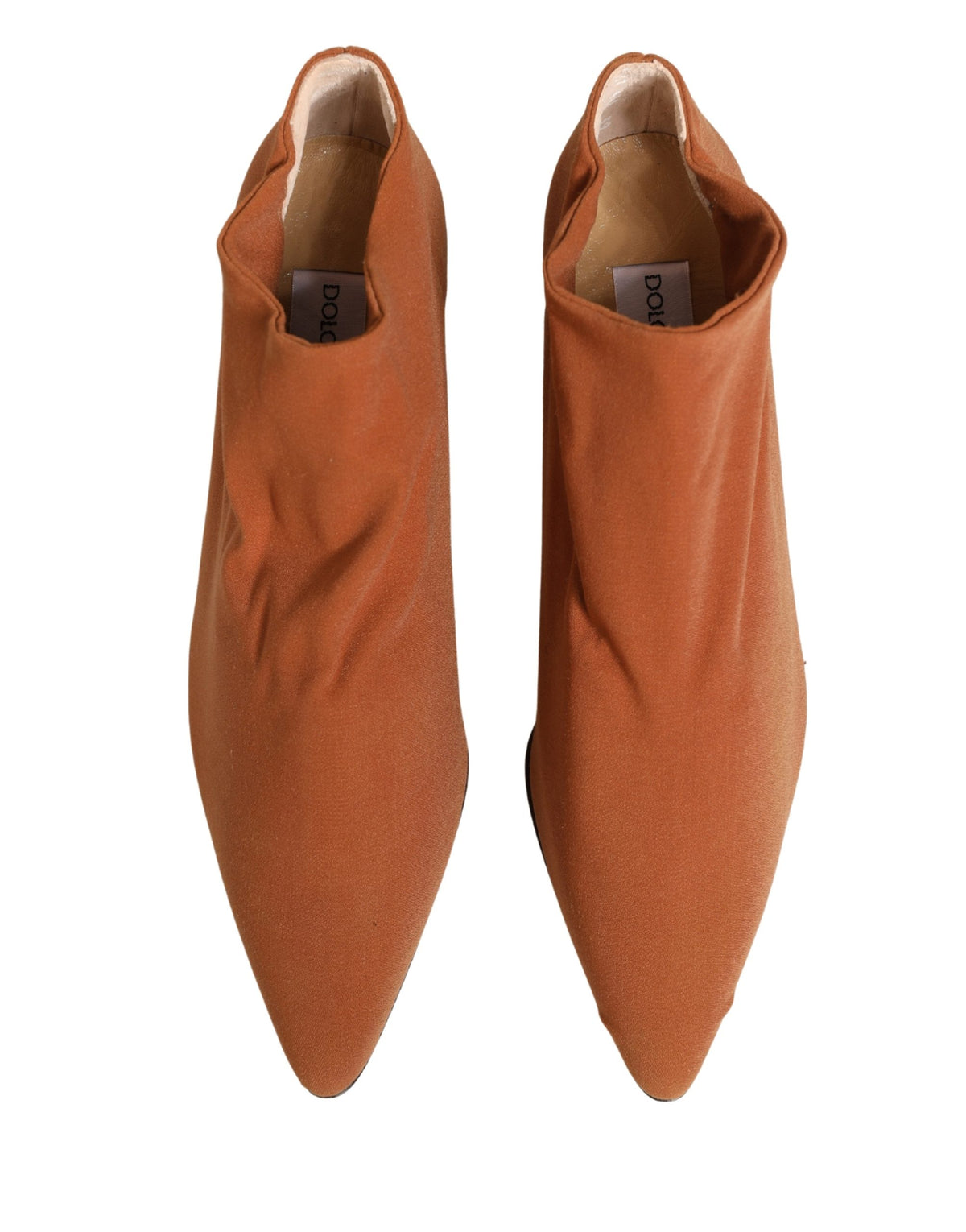 Step into opulence with Dolce & Gabbana's Brown Suede Ankle Boots, where exquisite Italian craftsmanship meets timeless elegance, perfect for the discerning individual.