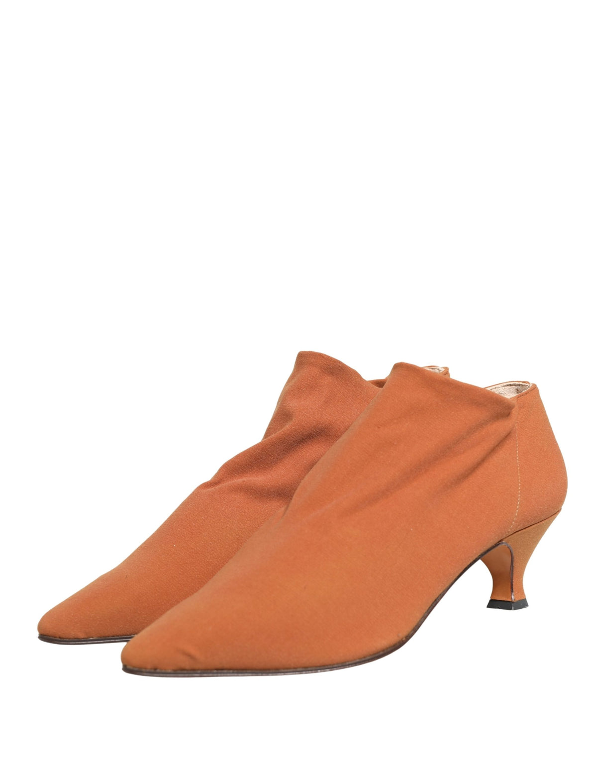 Indulge in the exquisite Dolce & Gabbana Brown Suede Ankle Boots, where Italian craftsmanship meets luxurious elegance, perfect for the discerning individual.