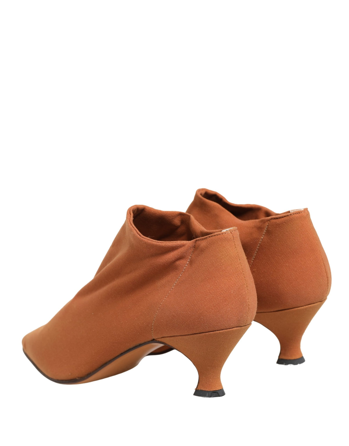Indulge in the exquisite Dolce & Gabbana Brown Suede Ankle Boots, a testament to Italian craftsmanship, elevating your elegance and sophistication with every step.