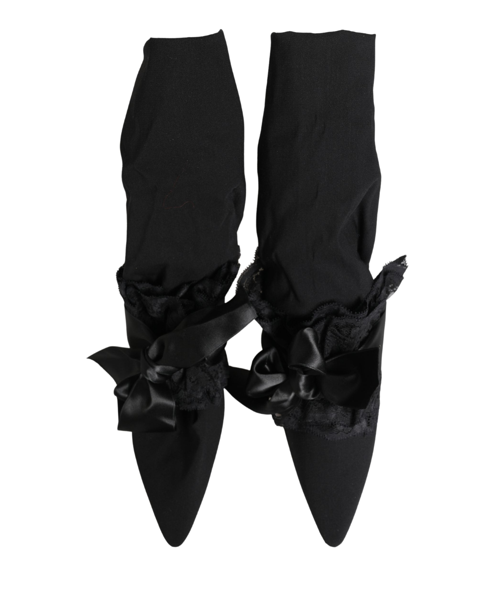 Experience the allure of Dolce & Gabbana's Black Suede Mid Calf Boots, where exquisite craftsmanship meets timeless elegance, elevating your style to new heights.