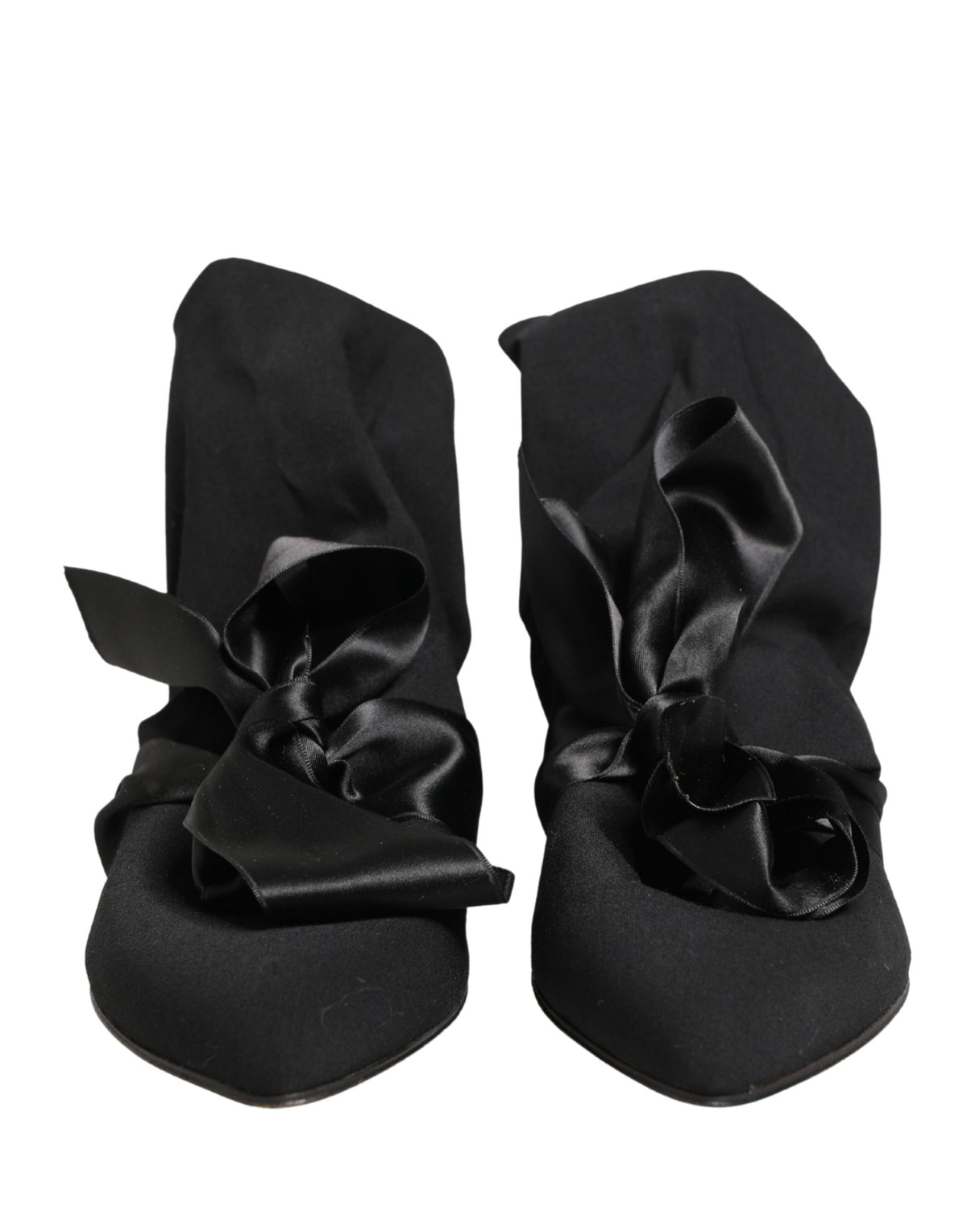 Elevate your elegance with Dolce & Gabbana's Black Suede Ankle Boots, a masterpiece of Italian craftsmanship that embodies timeless luxury and sophisticated allure.