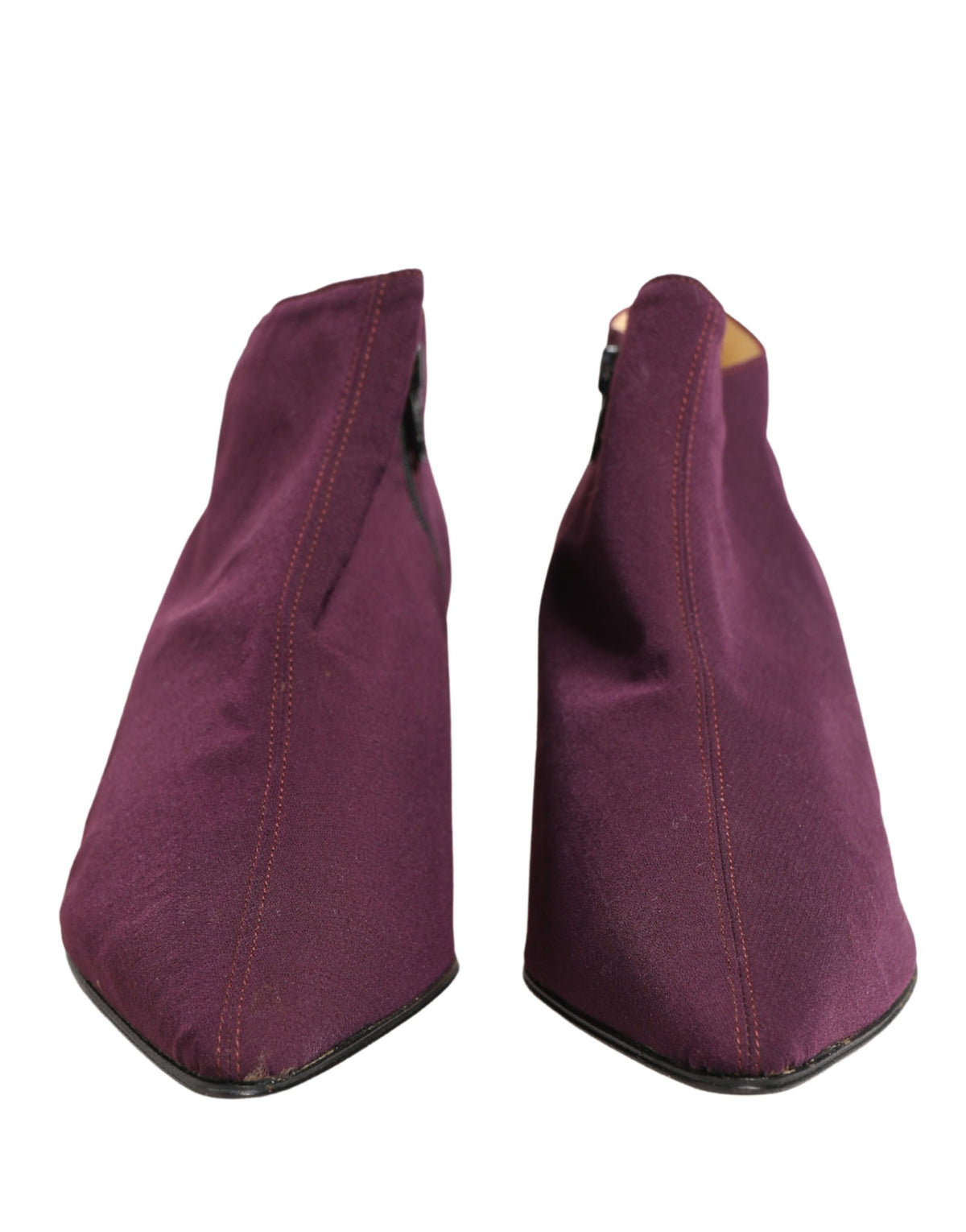 Indulge in the exquisite Dolce & Gabbana Purple Suede Ankle Boots, a testament to Italian craftsmanship that elevates your style with luxurious allure and timeless elegance.