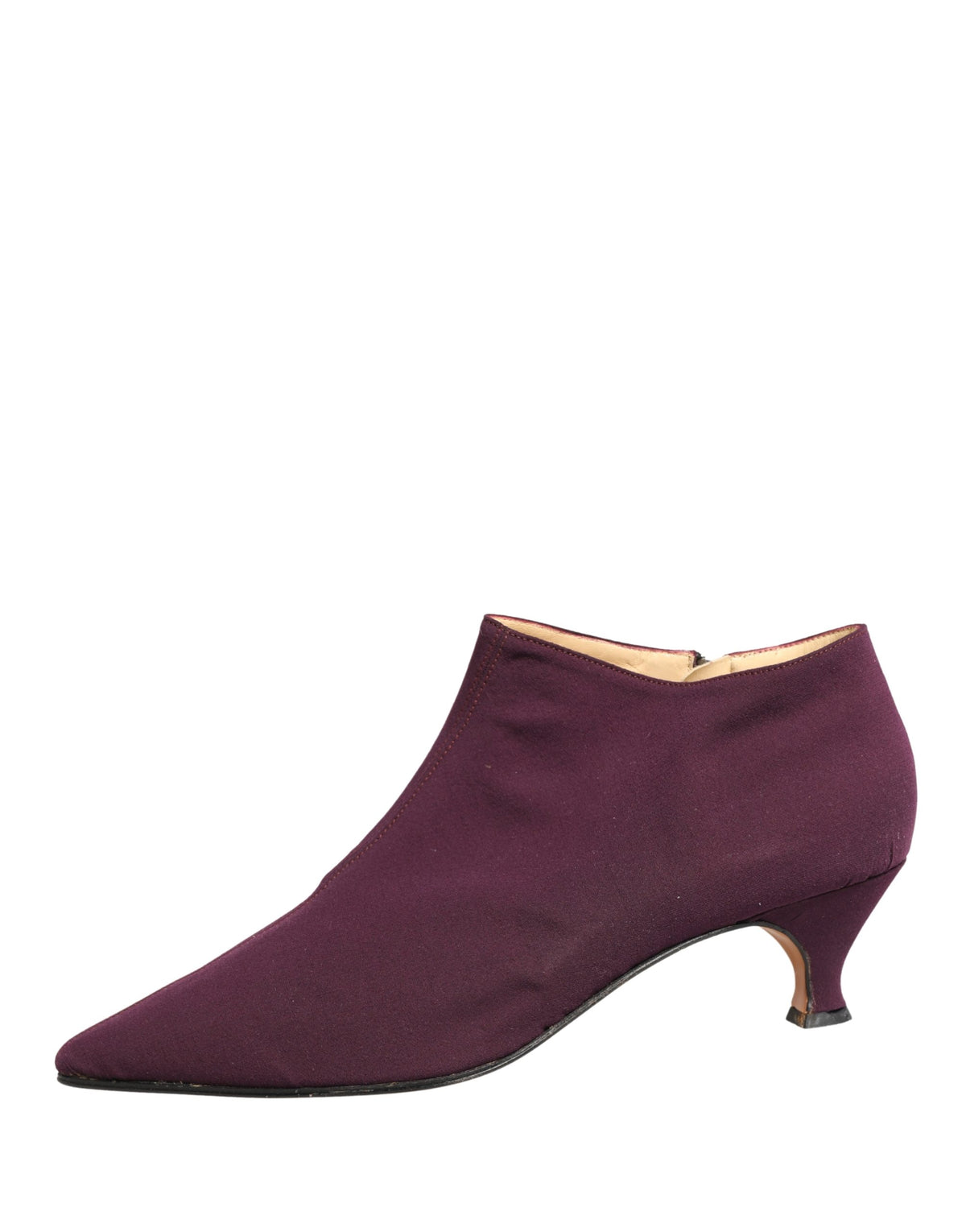 Indulge in the exquisite Dolce & Gabbana Purple Suede Ankle Boots, where luxurious craftsmanship meets timeless elegance, perfect for the discerning connoisseur.