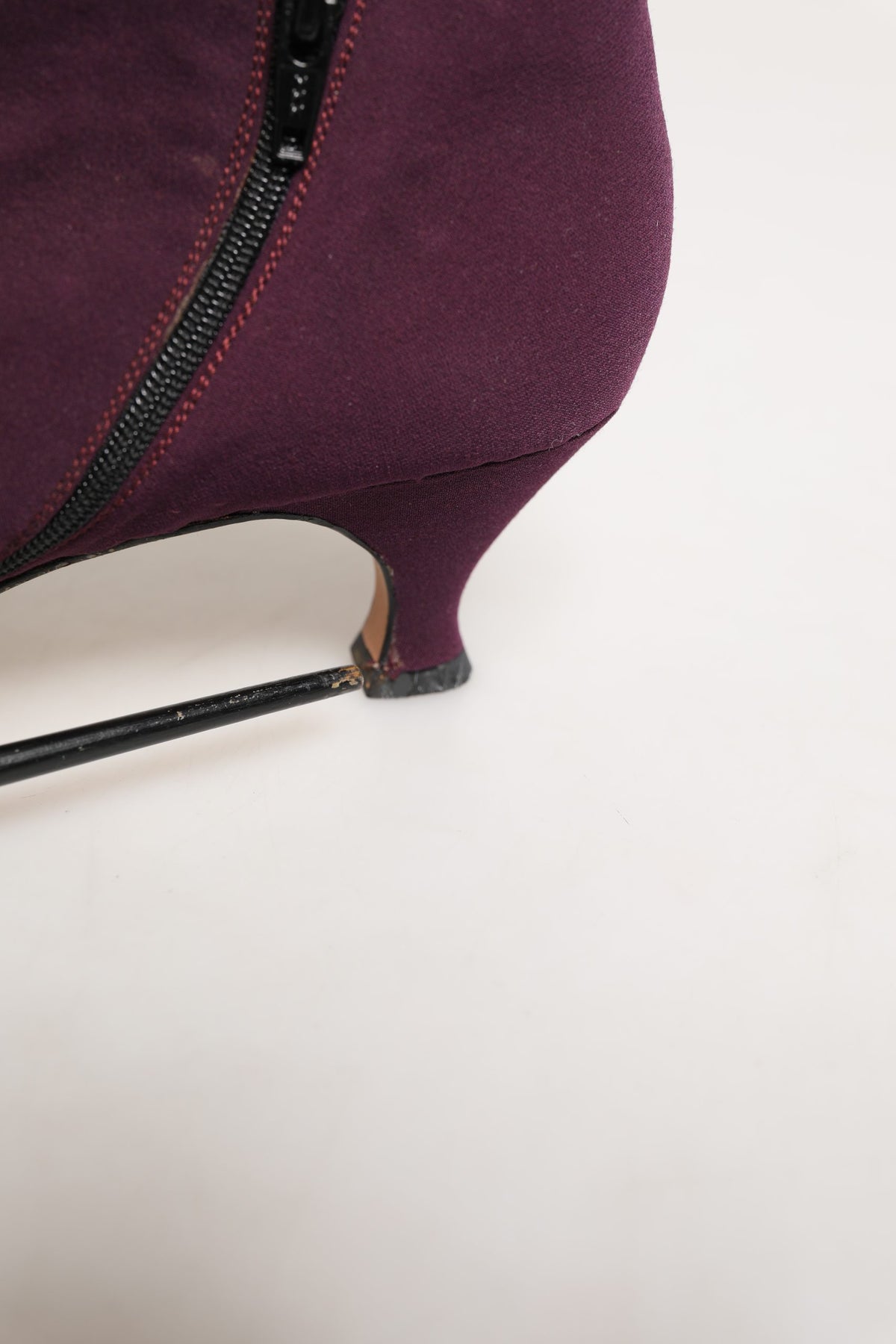 Indulge in the exquisite Dolce & Gabbana Purple Suede Ankle Boots, where luxurious craftsmanship meets timeless elegance, perfect for the discerning connoisseur.