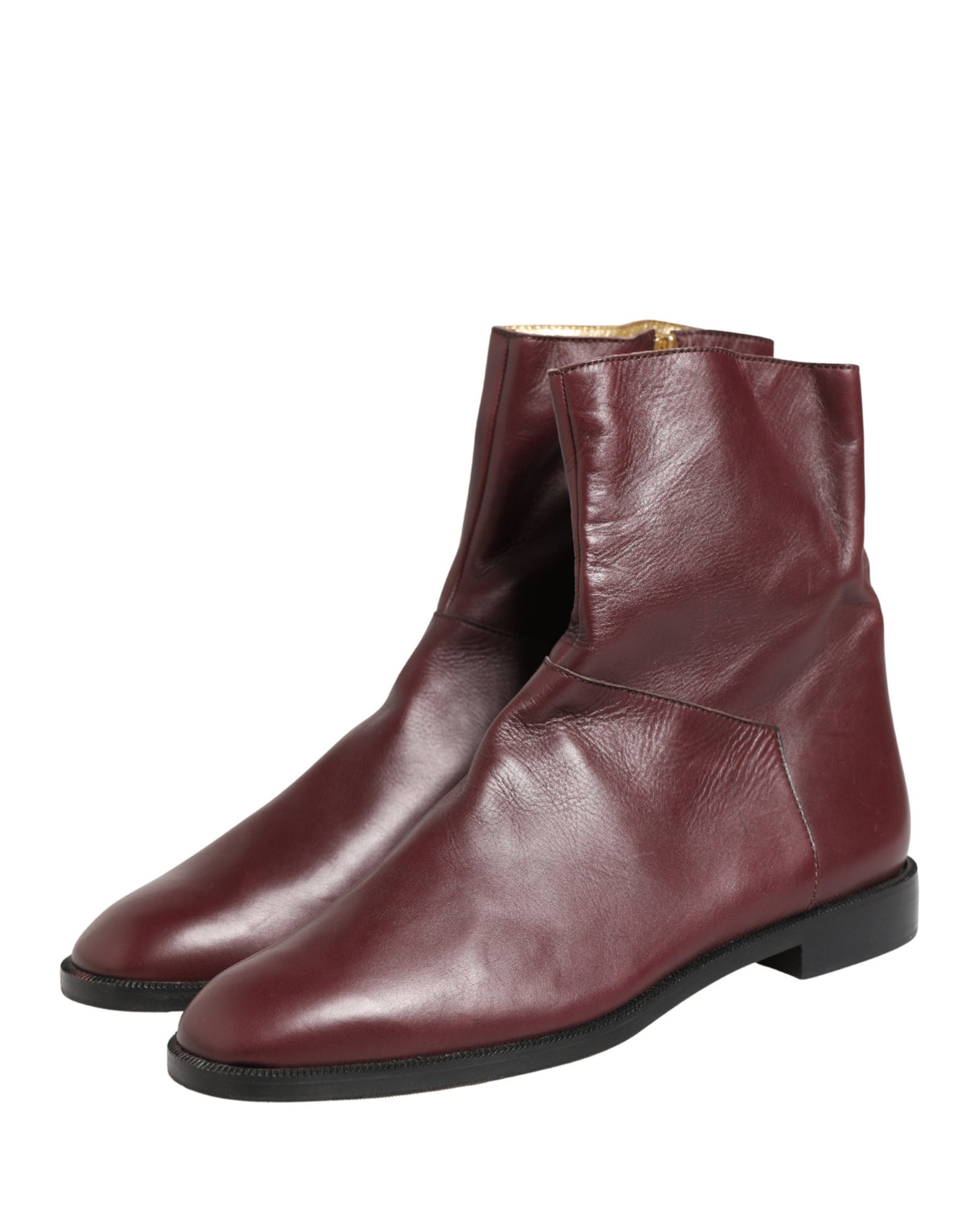 Elevate your style with the exquisite Dolce & Gabbana Maroon Leather Flats Biker Ankle Boots, a testament to Italian craftsmanship and luxurious allure for every occasion.