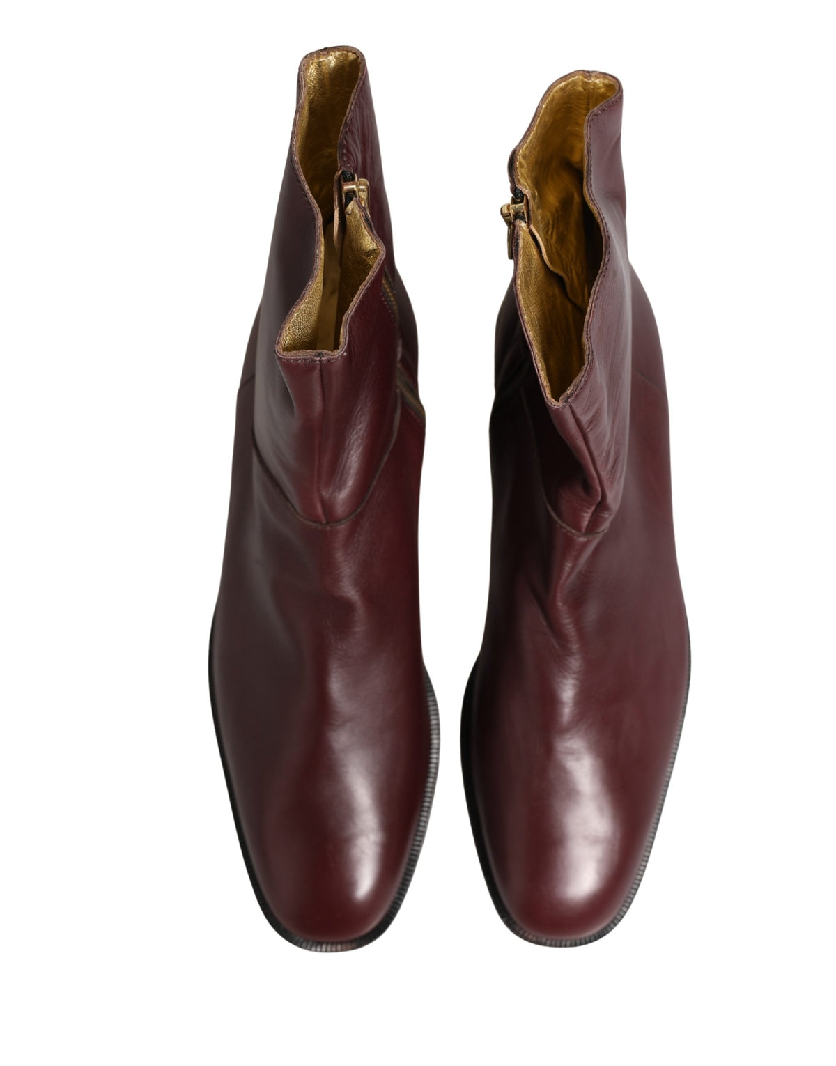 Elevate your style with the exquisite Dolce & Gabbana Maroon Leather Flats Biker Ankle Boots, a testament to Italian craftsmanship and luxurious allure for any occasion.
