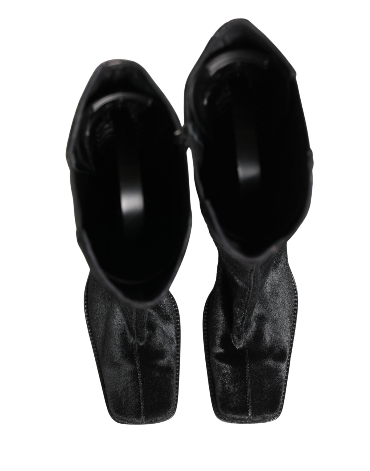 Experience the allure of Dolce & Gabbana's Black Suede Leather Knee High Boots, where exquisite Italian craftsmanship meets timeless elegance for the discerning fashion connoisseur.