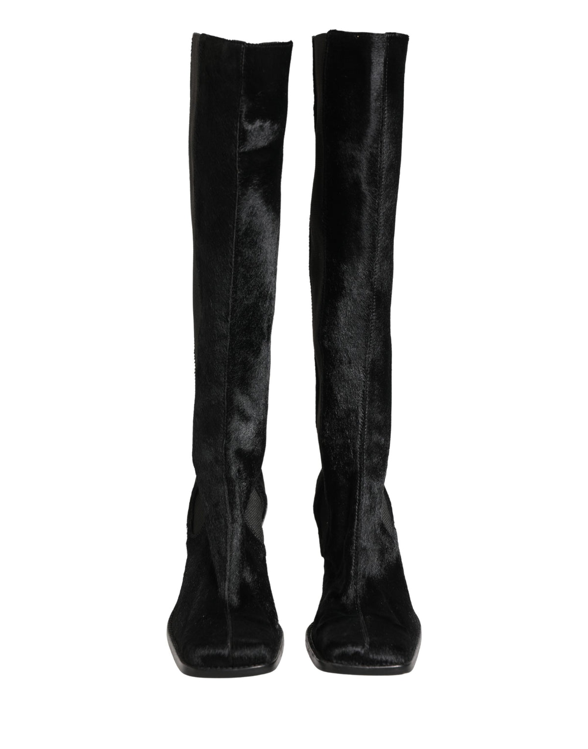 Step into the allure of Dolce & Gabbana's Black Suede Leather Knee High Boots, where exquisite Italian craftsmanship meets timeless elegance, perfect for any occasion.