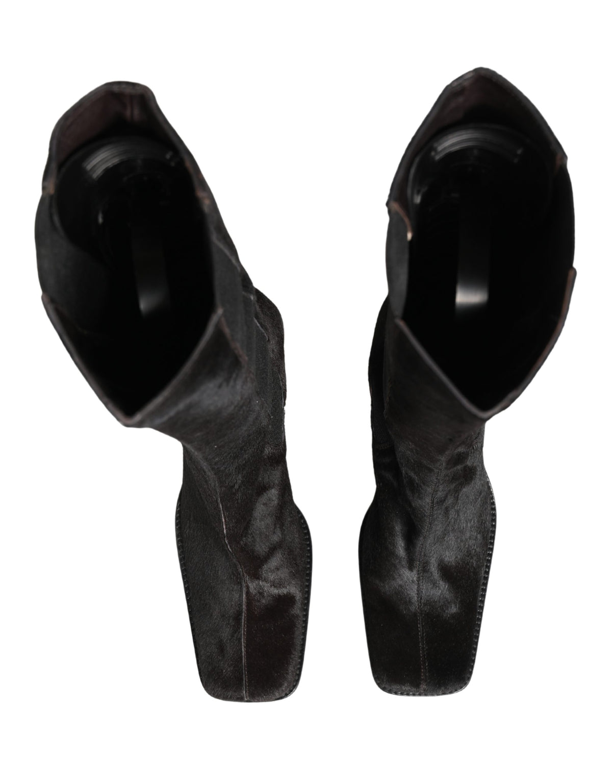 Step into elegance with Dolce & Gabbana's Black Suede Leather Knee High Boots, where exquisite craftsmanship meets timeless allure, perfect for the discerning connoisseur.