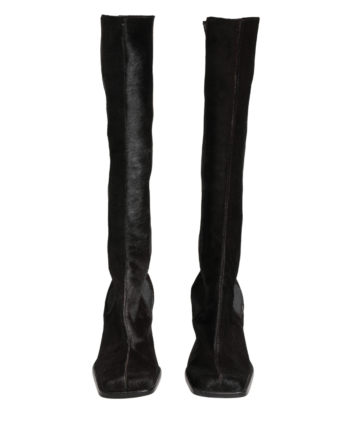 Elevate your style with Dolce & Gabbana's Black Suede Leather Knee High Boots, a masterpiece of Italian craftsmanship that embodies luxury and sophistication.
