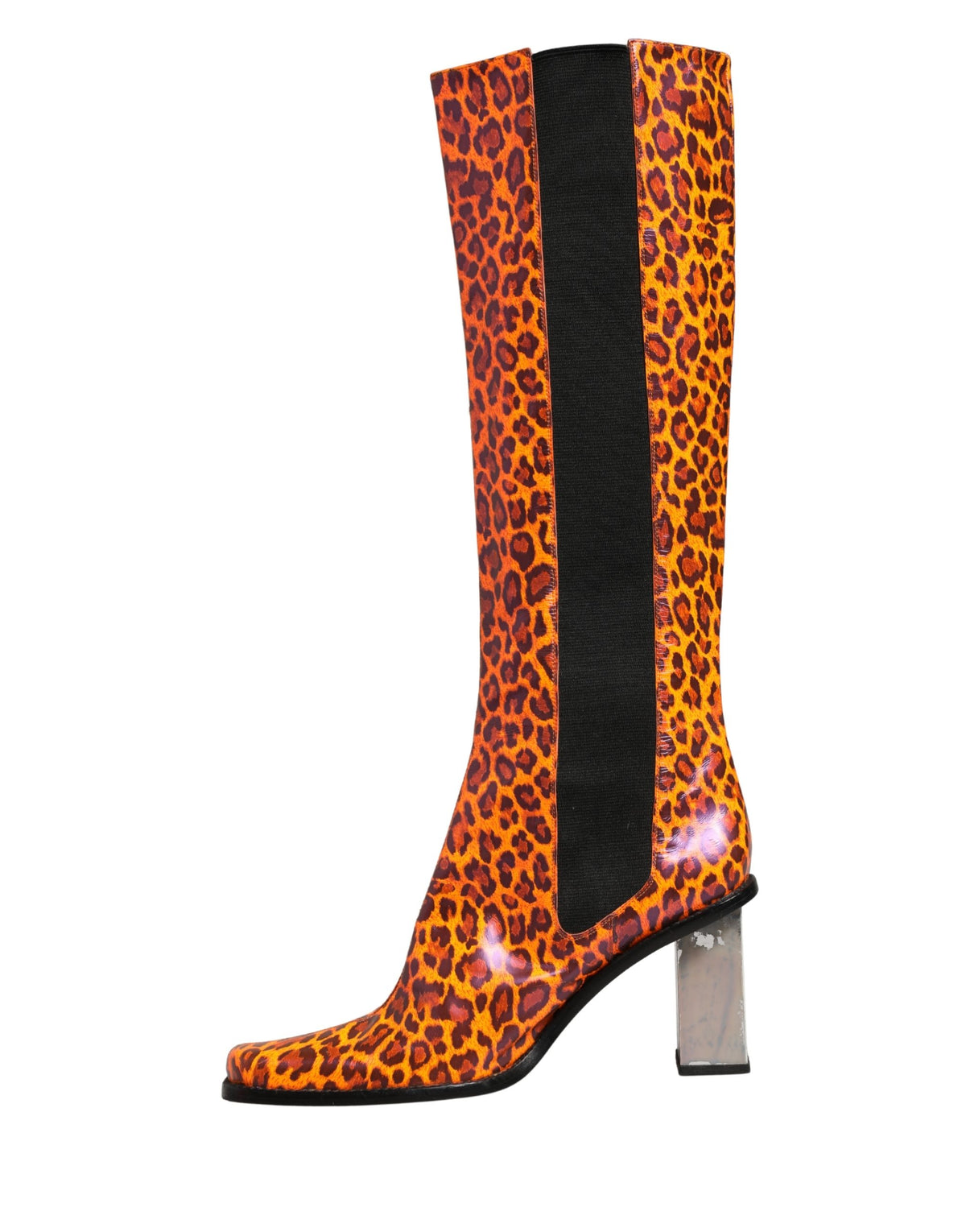 Elevate your style with Dolce & Gabbana's Brown Leopard Leather Knee High Boots, a testament to exquisite Italian craftsmanship and timeless luxury.