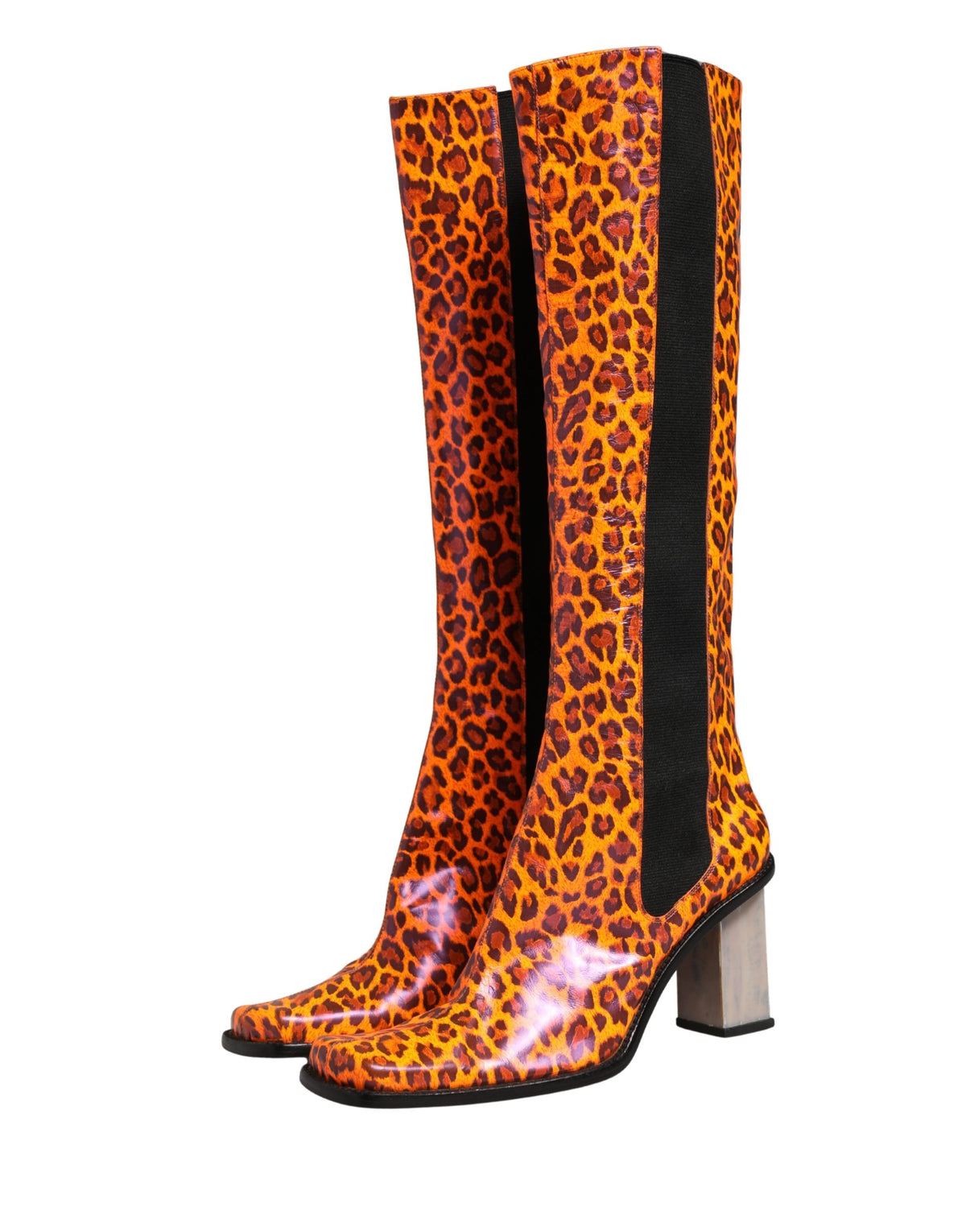 Step into timeless elegance with Dolce & Gabbana's Brown Leopard Leather Knee High Boots, where exquisite Italian craftsmanship meets luxurious allure for the discerning connoisseur.