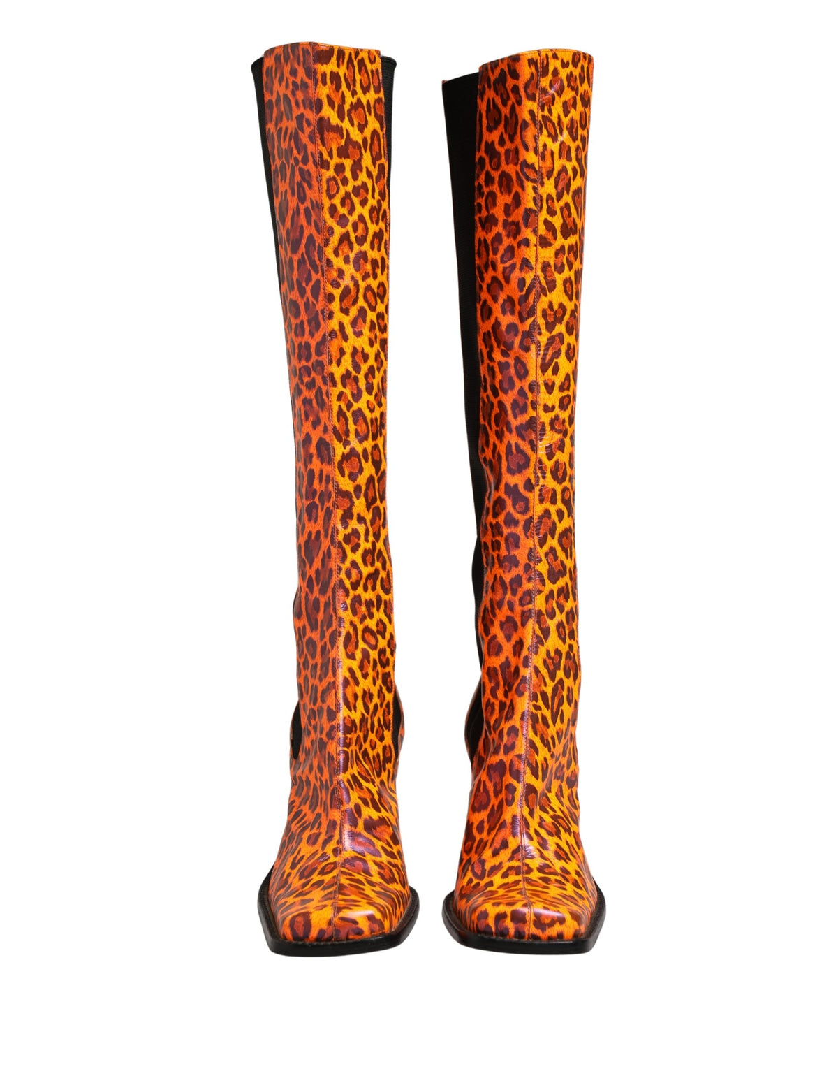 Step into the world of elegance with Dolce & Gabbana's Brown Leopard Leather Knee High Boots, where exquisite Italian craftsmanship meets timeless luxury, perfect for the discerning fashion lover.