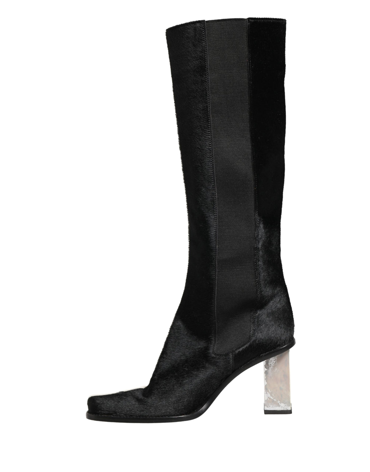 Step into the allure of Dolce & Gabbana's knee-high boots, where exquisite leather meets timeless elegance, embodying luxury and sophistication for every occasion.