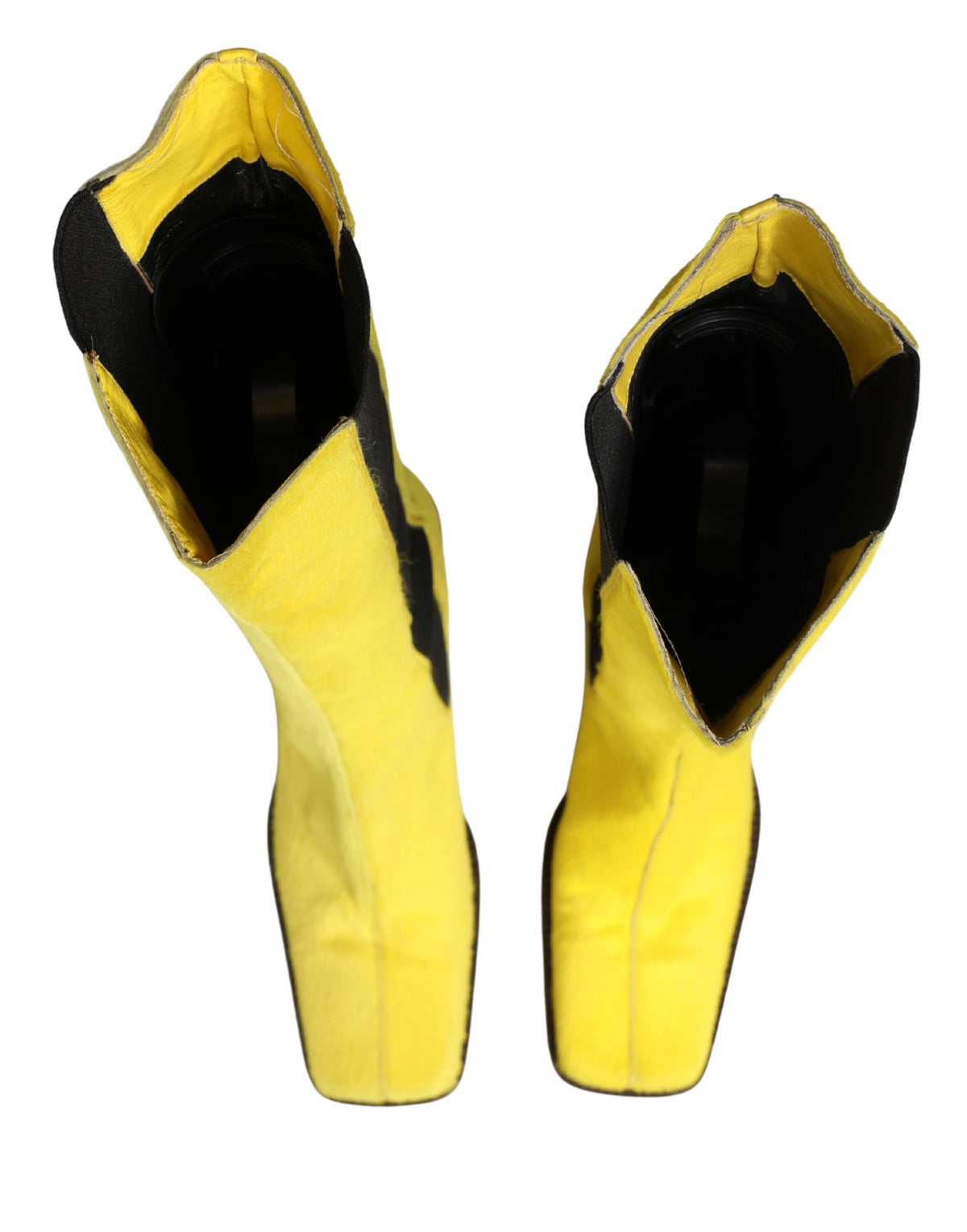 Indulge in the exquisite craftsmanship of Dolce & Gabbana's knee-high boots, where luxurious leather meets bold elegance, elevating your style with timeless sophistication.