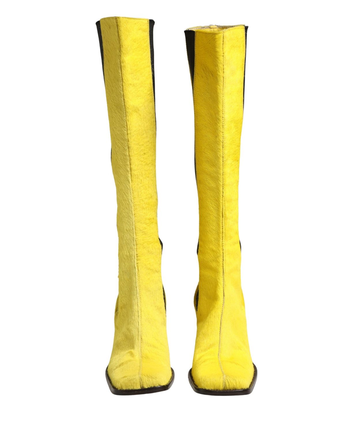 Elevate your style with Dolce & Gabbana's exquisite knee-high boots, a masterclass in Italian craftsmanship, embodying luxury and timeless elegance for every occasion.