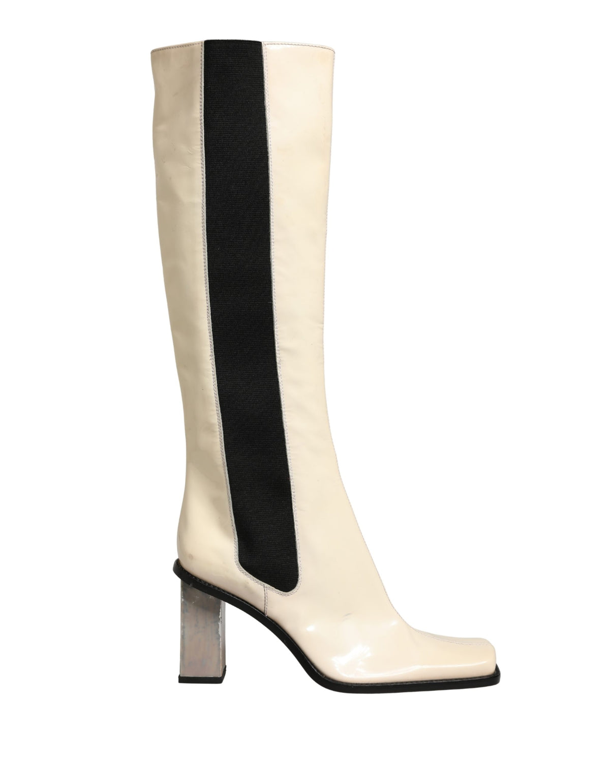 Indulge in the exquisite craftsmanship of Dolce & Gabbana's knee-high boots, where luxurious leather meets timeless elegance, perfect for the discerning fashion connoisseur.