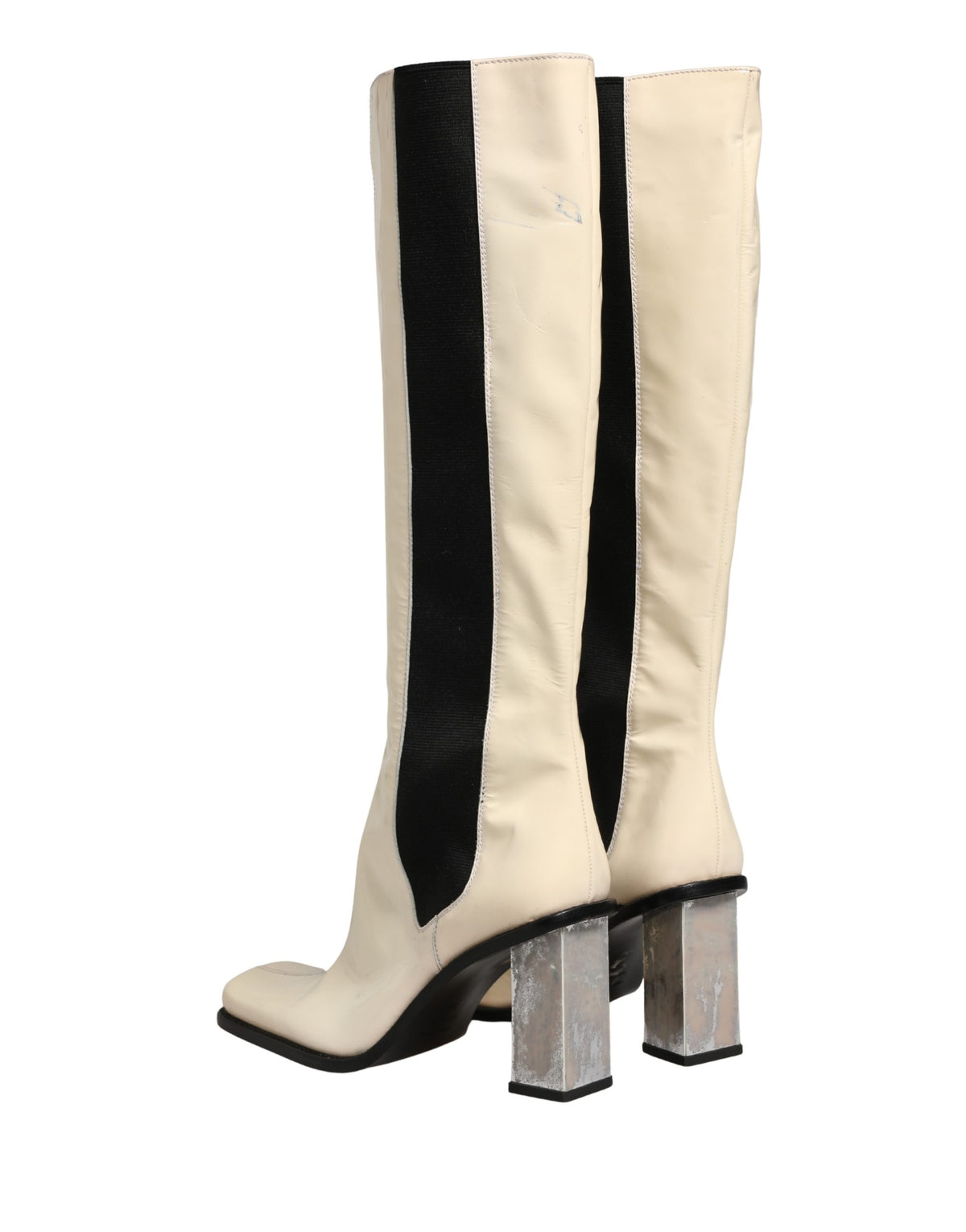 Elevate your style with Dolce & Gabbana's exquisite knee-high boots, crafted from premium leather, embodying luxury and Italian artistry for the discerning individual.