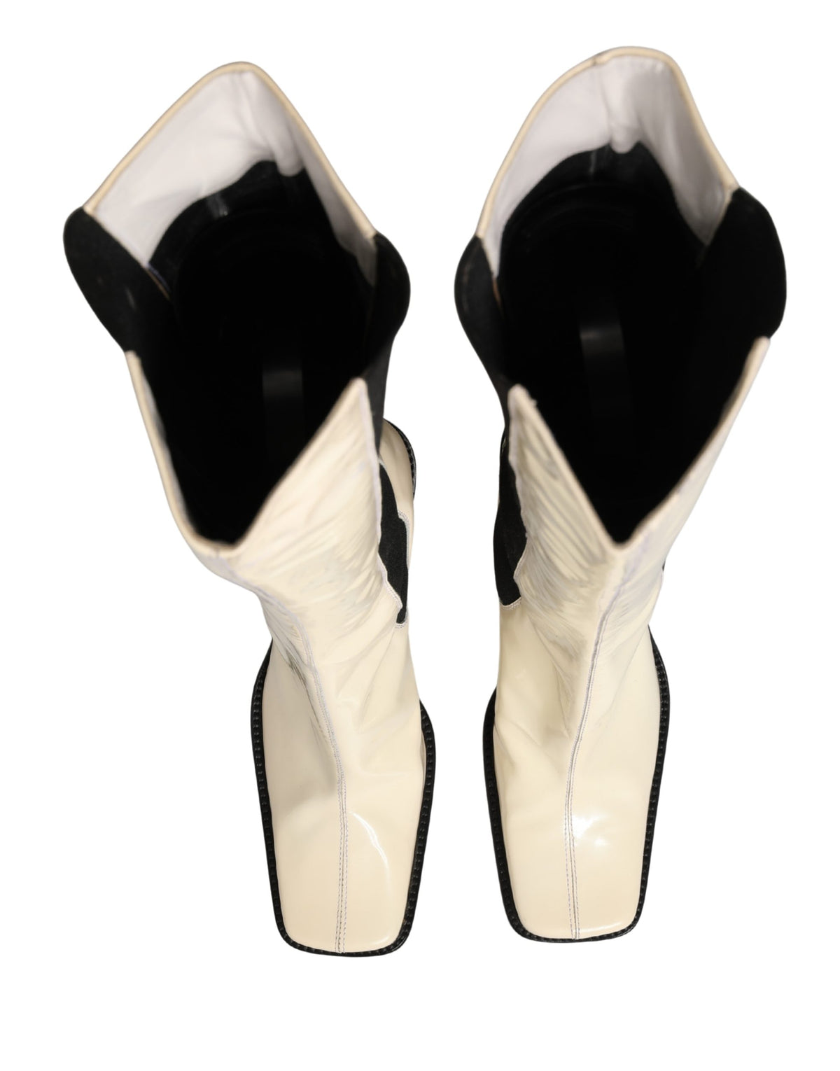 Elevate your style with Dolce & Gabbana's exquisite knee-high boots, crafted from premium leather, embodying Italian artistry and timeless sophistication.