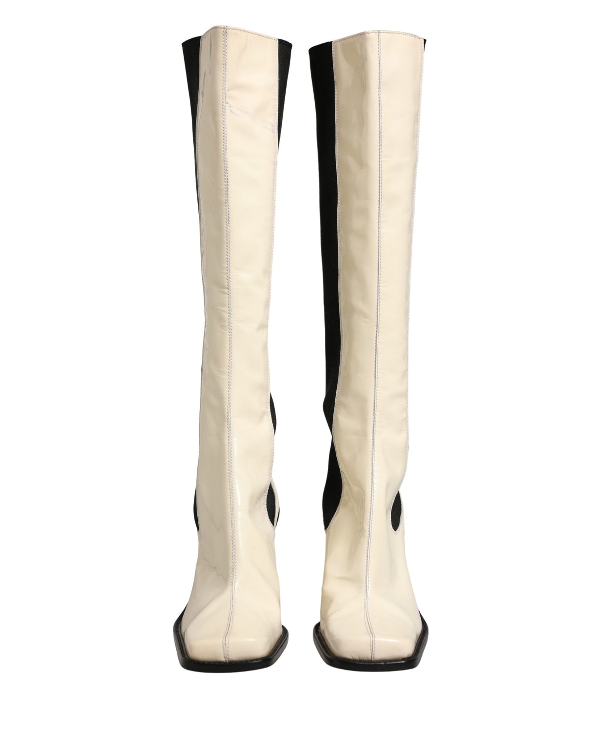 Step into unparalleled elegance with Dolce & Gabbana's knee-high boots, where exquisite leather craftsmanship meets timeless sophistication, perfect for any discerning wardrobe.