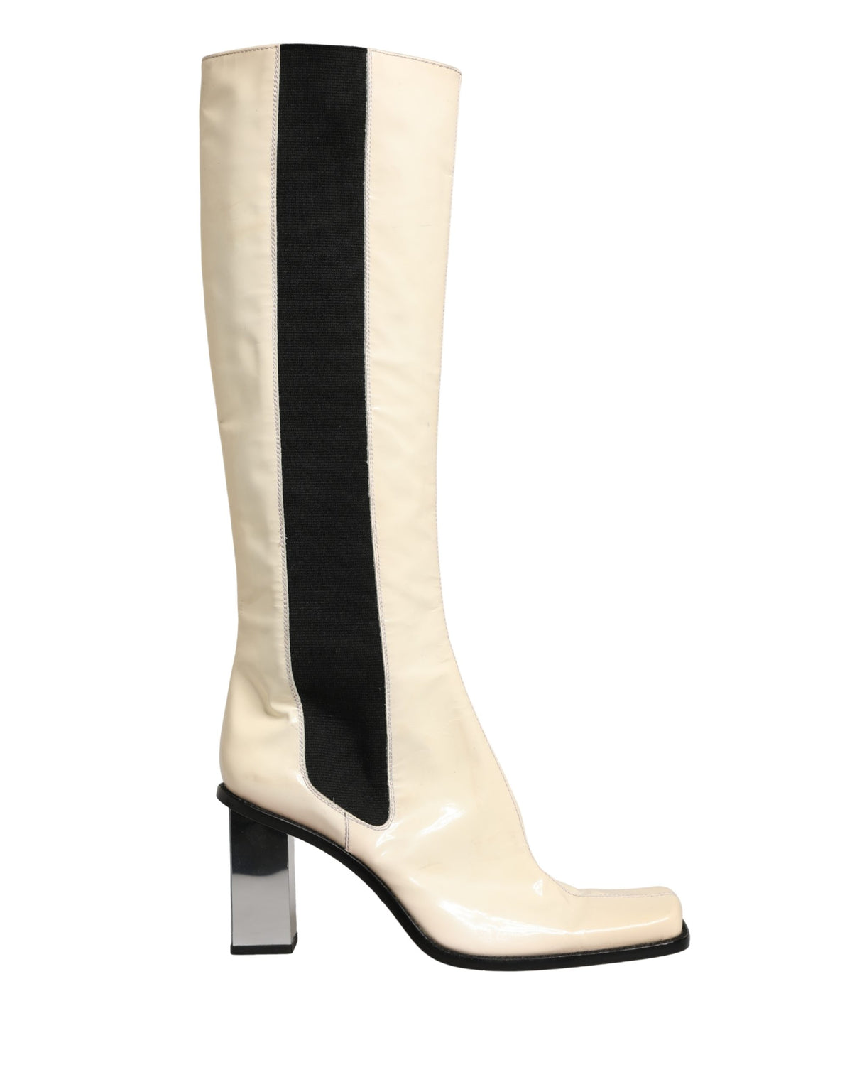 Step into the realm of elegance with Dolce & Gabbana's White Black Leather Knee High Boots, where exquisite craftsmanship meets timeless allure, perfect for any sophisticated wardrobe.
