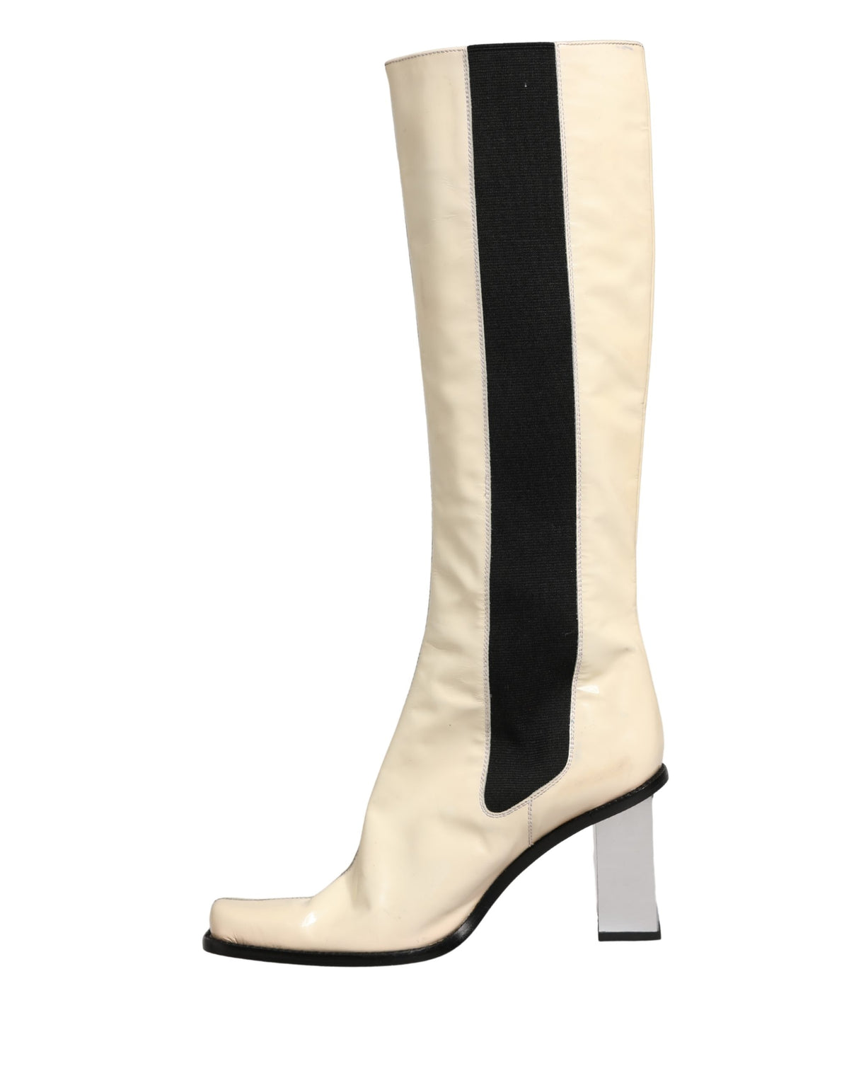 Step into the realm of elegance with Dolce & Gabbana's White Black Leather Knee High Boots, where exquisite craftsmanship meets timeless luxury, perfect for the discerning fashion connoisseur.