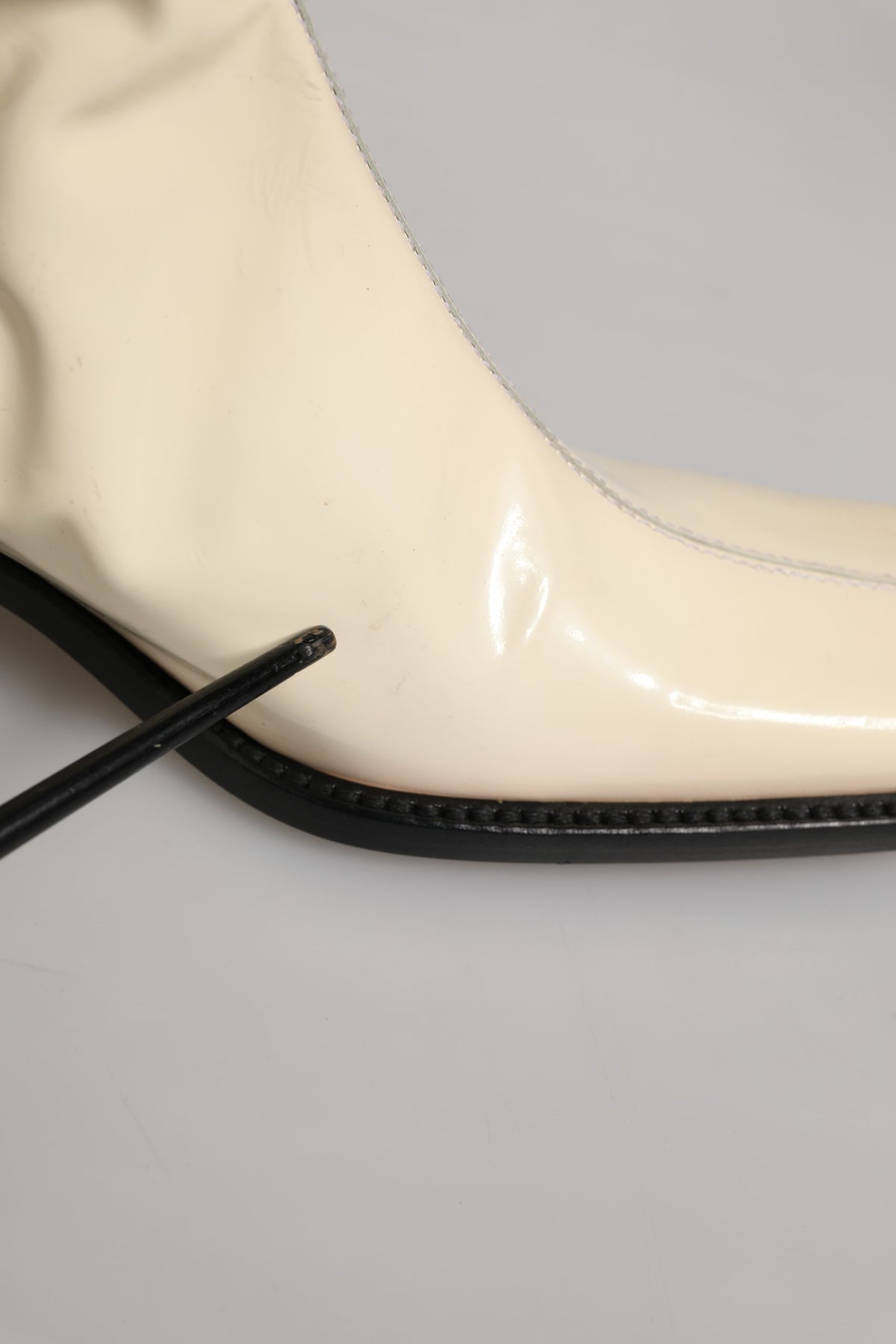 Elevate your style with Dolce & Gabbana's exquisite knee-high boots, where artisanal leather craftsmanship meets timeless elegance, perfect for the discerning fashion connoisseur.